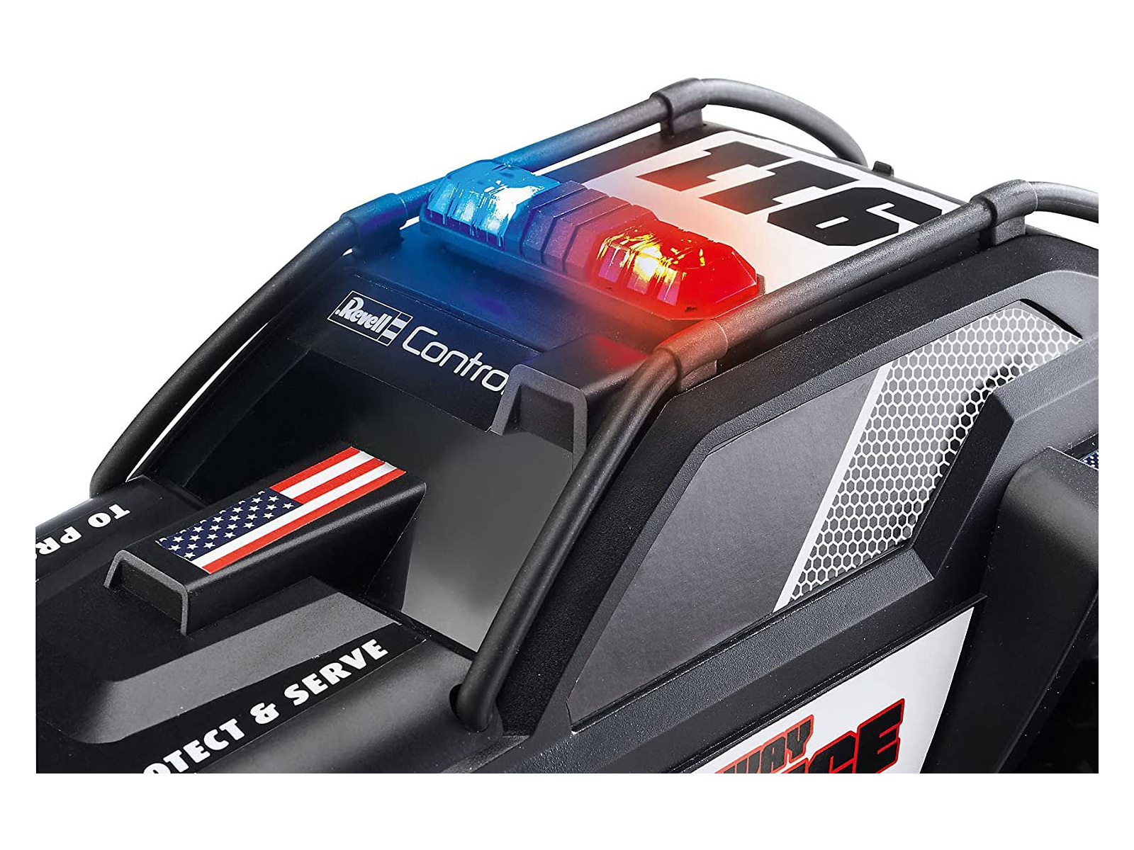 Nahaufnahme eines Spielzeug-Polizeiautos. Merkmale sind blaue und rote Lichter sowie eine amerikanische Flagge.