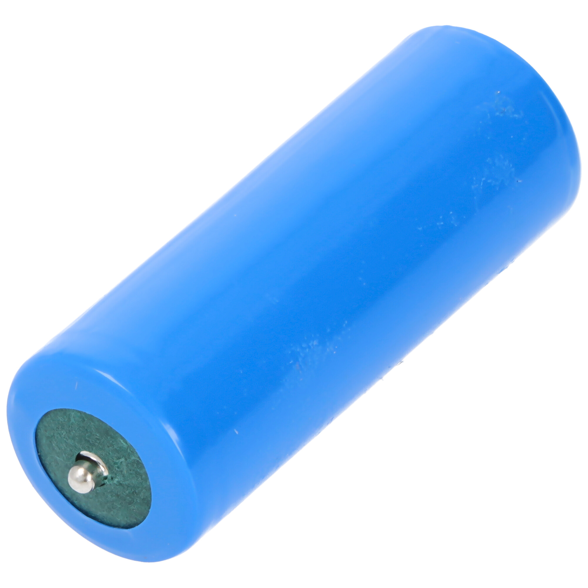 A blue cylindrical battery with a silver top. The battery is on a white surface.