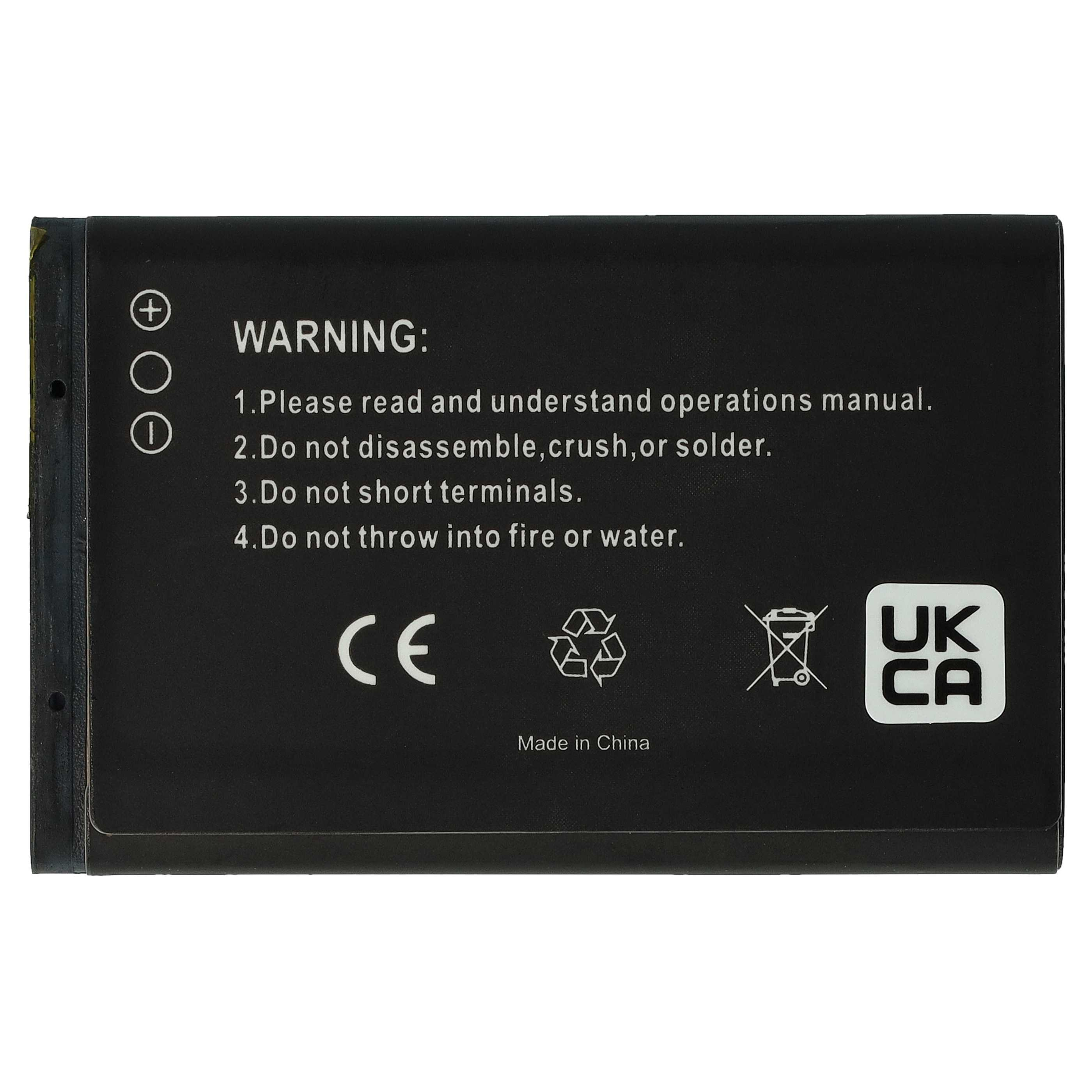 Eine schwarze Batterie mit Warnhinweis: Handbuch lesen, nicht zerlegen, quetschen oder löten. CE-Kennzeichen.