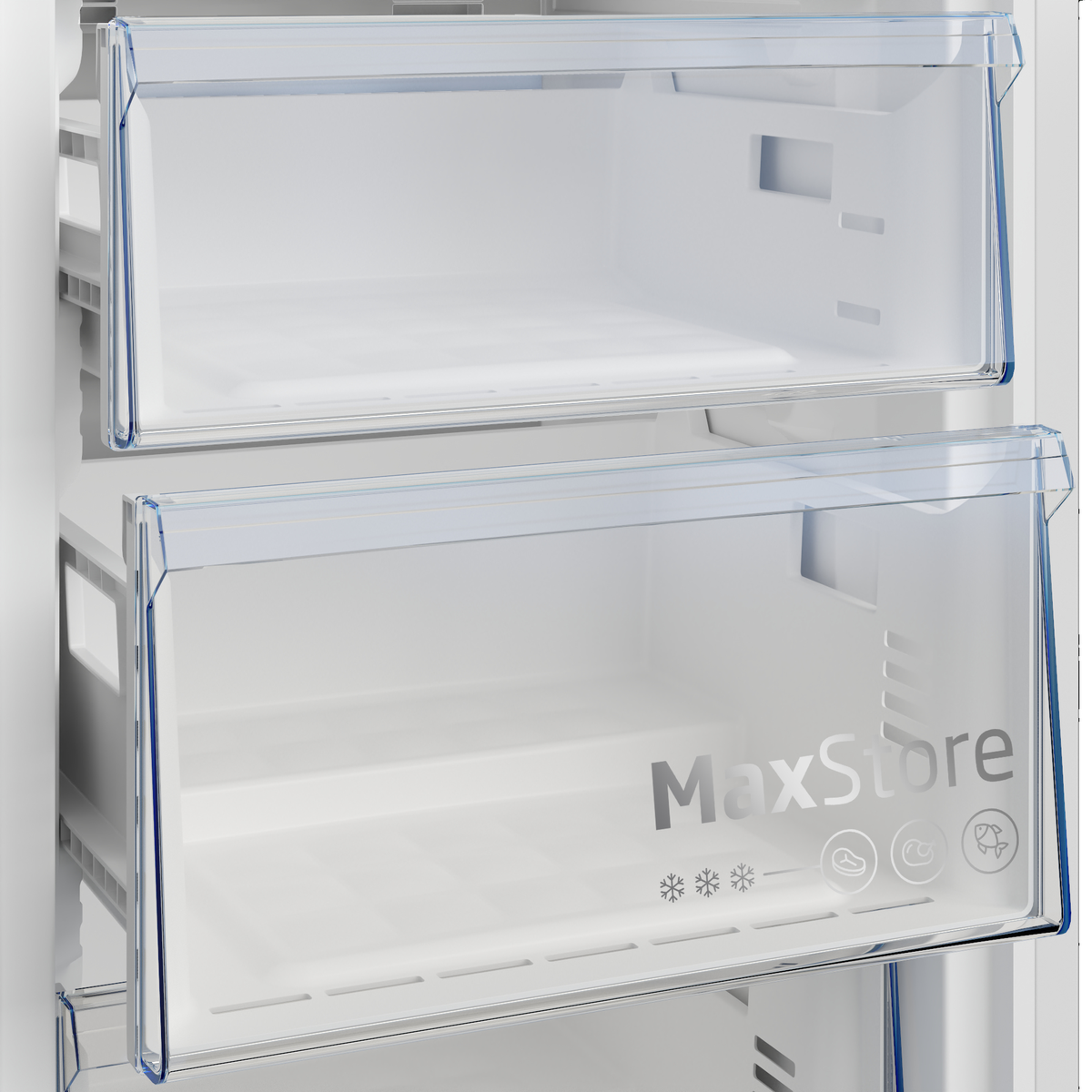 Interior de frigorífico con dos cajones transparentes, el inferior con el texto "MaxStore" e iconos.