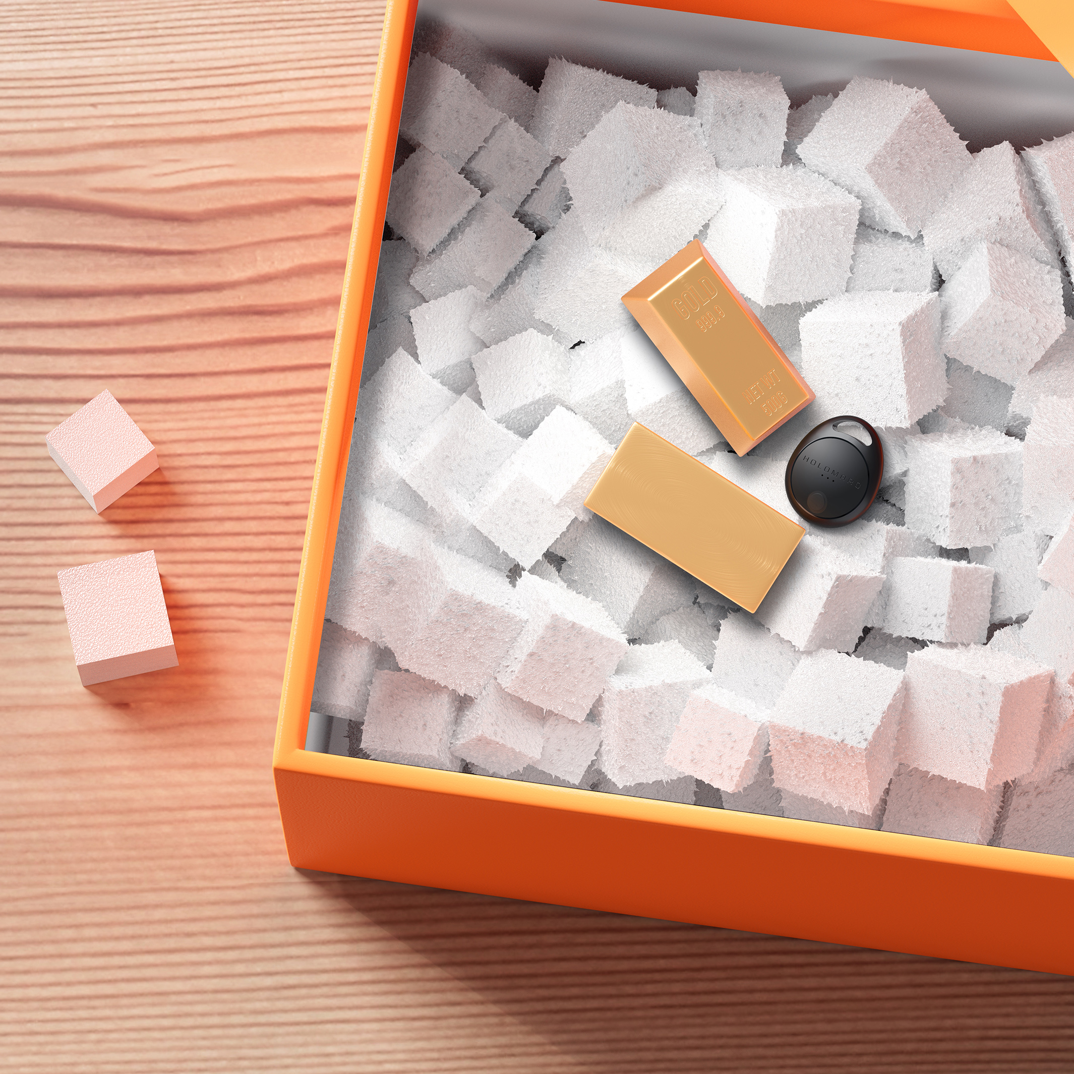 Eine offene orangefarbene Box mit weißen Schaumstoffwürfeln gefüllt. Goldbarren und ein schwarzes Objekt sind drin.