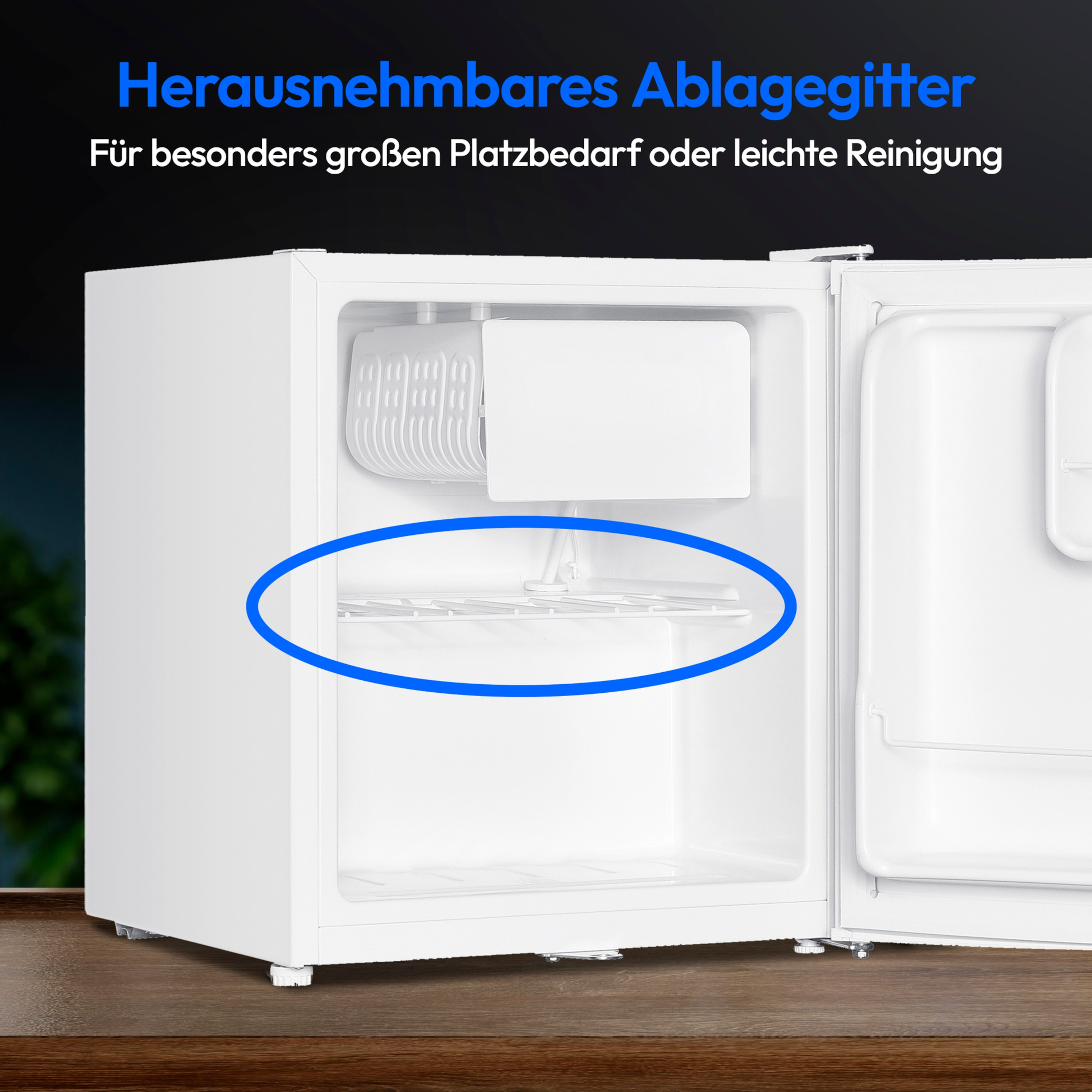 Witte mini-koelkast met open deur. Een plank is gemarkeerd. Tekst in het Duits: uitneembare plank.