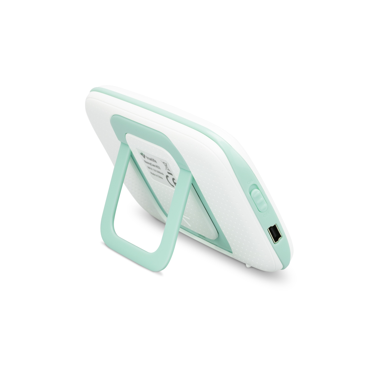 Babyphone, weiß und mintgrün, abgewinkelt, mit Ständer, Knöpfen und Ladeanschluss sichtbar.