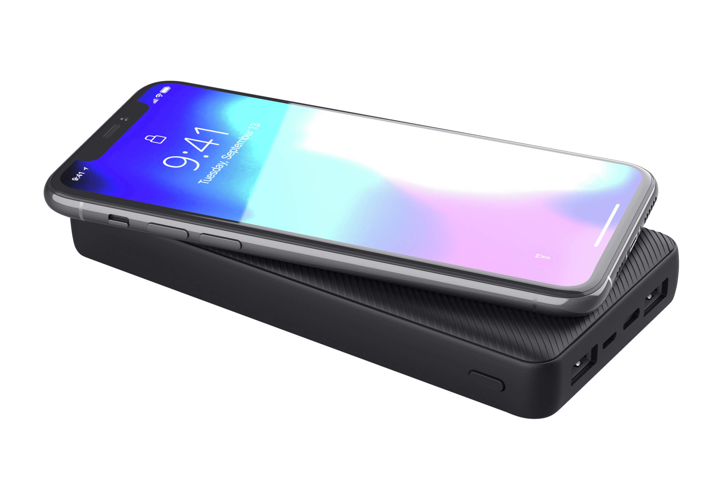 Czarny power bank z telefonem spoczywającym na górze.