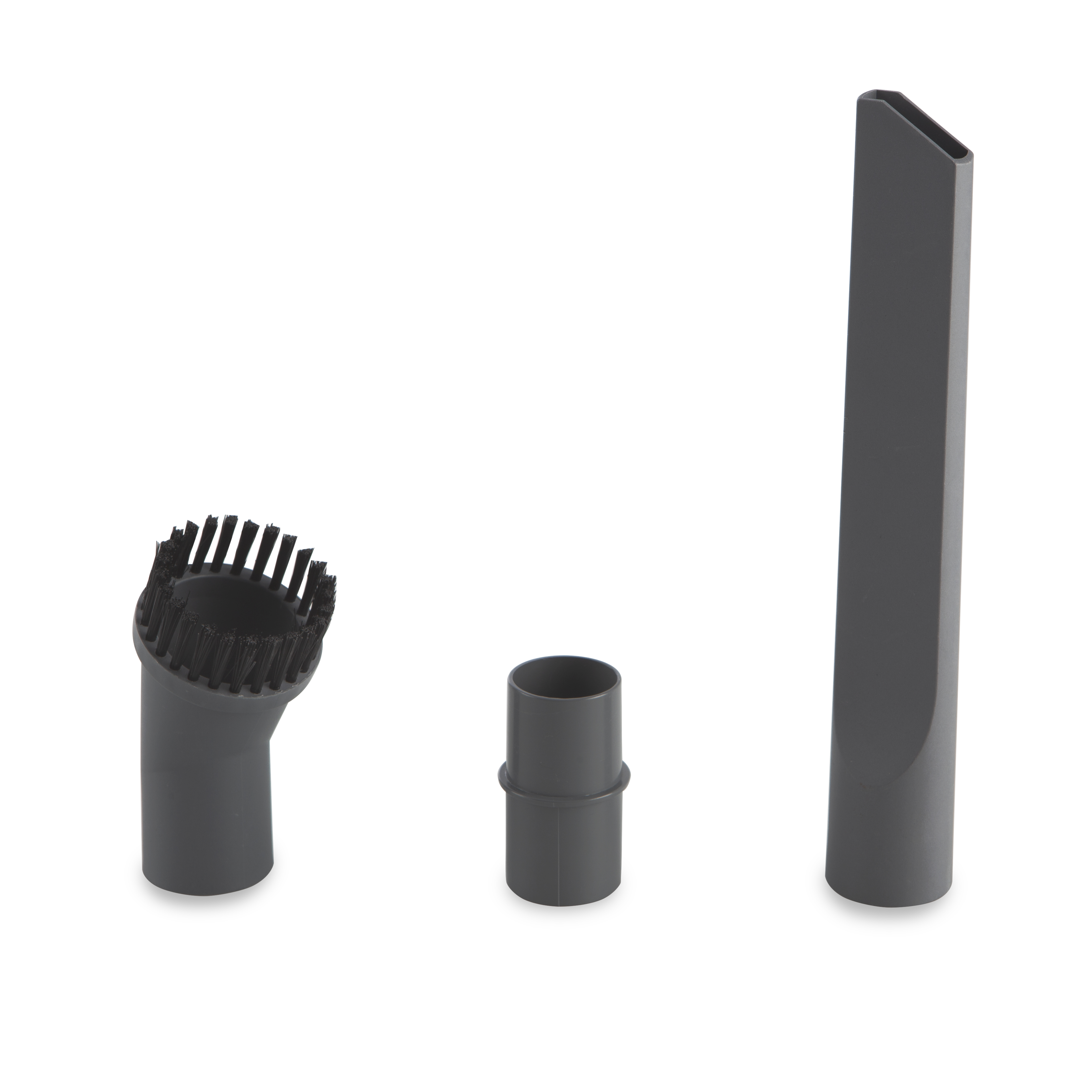 Tres accesorios grises para aspiradora: un cepillo, un tubo pequeño y una boquilla para rincones larga.