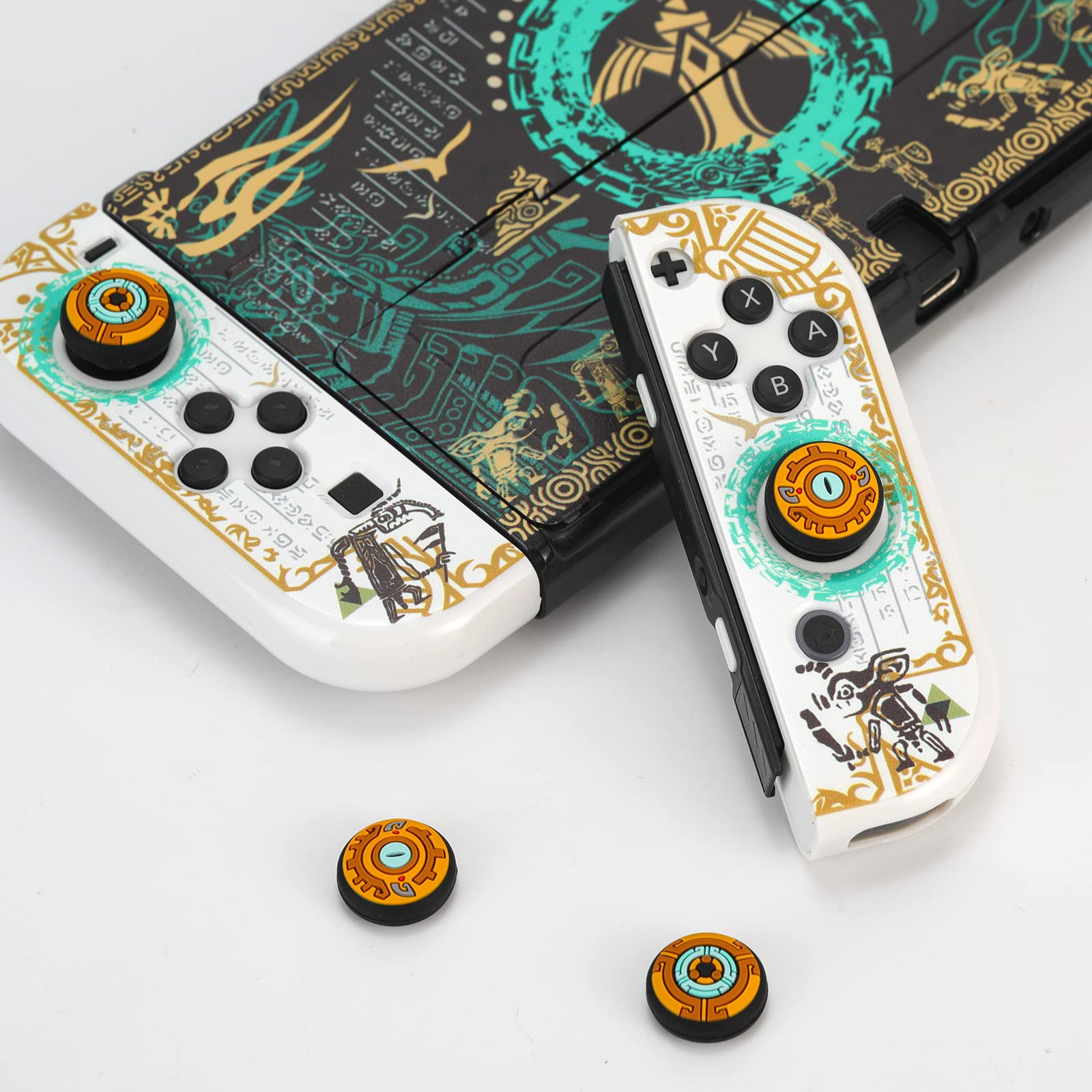 Weiß-goldenes Switch-Controller-Thema. Enthält ein Paar Controller und Tastenabdeckungen.