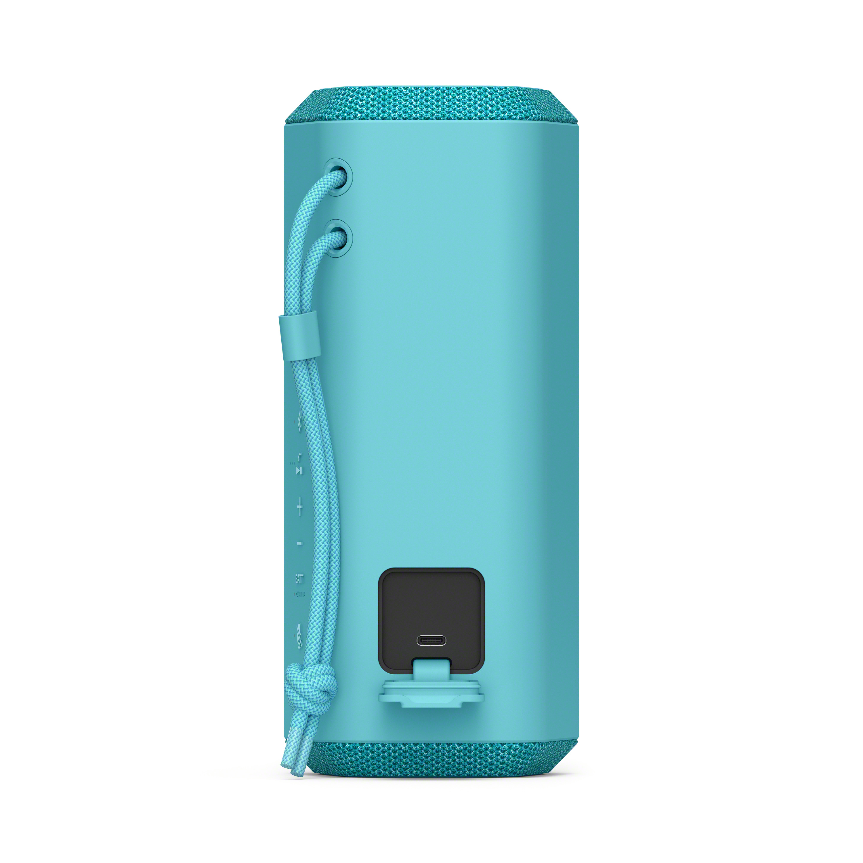 Un altavoz Bluetooth turquesa con un cordón azul. Tiene un puerto de carga y controles de botón.