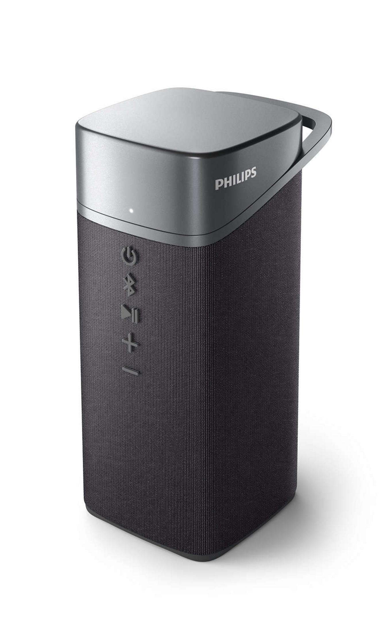 Altoparlante Philips grigio scuro con maniglia in alto. L'altoparlante è cilindrico con rivestimento in tessuto.