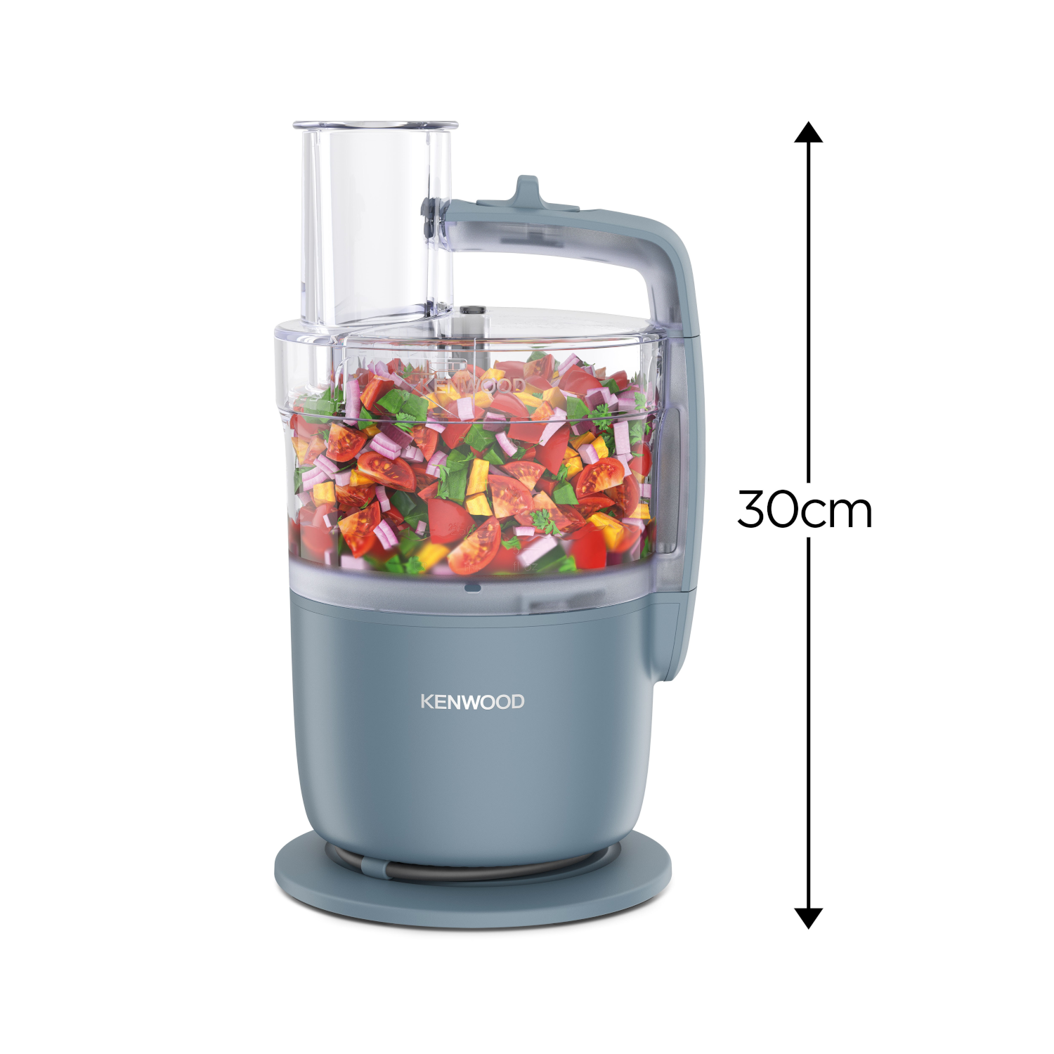 Un robot da cucina con verdure tritate all'interno e una misura.