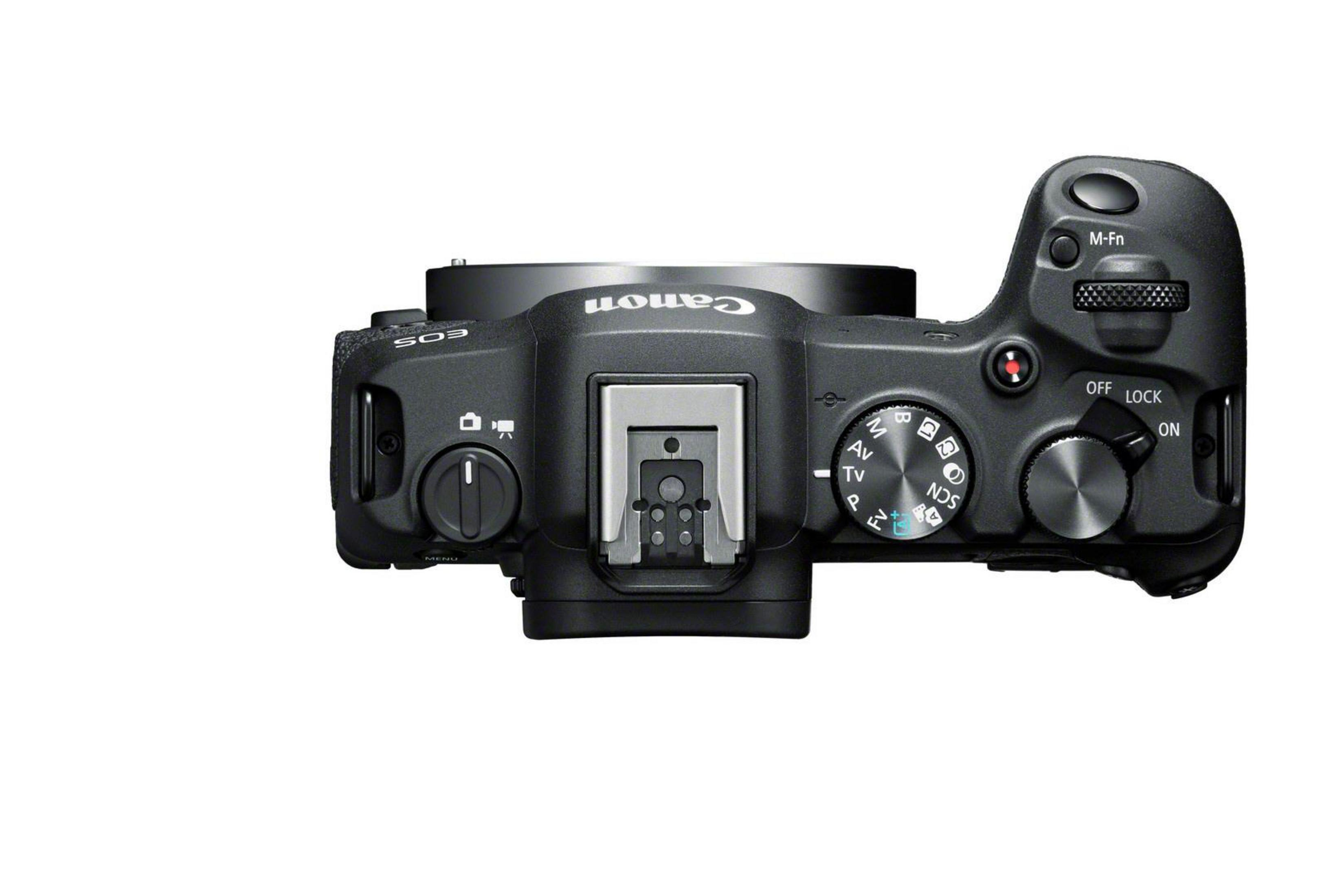 Canon camera from above, black body, many buttons and dials, centered on a white background.
