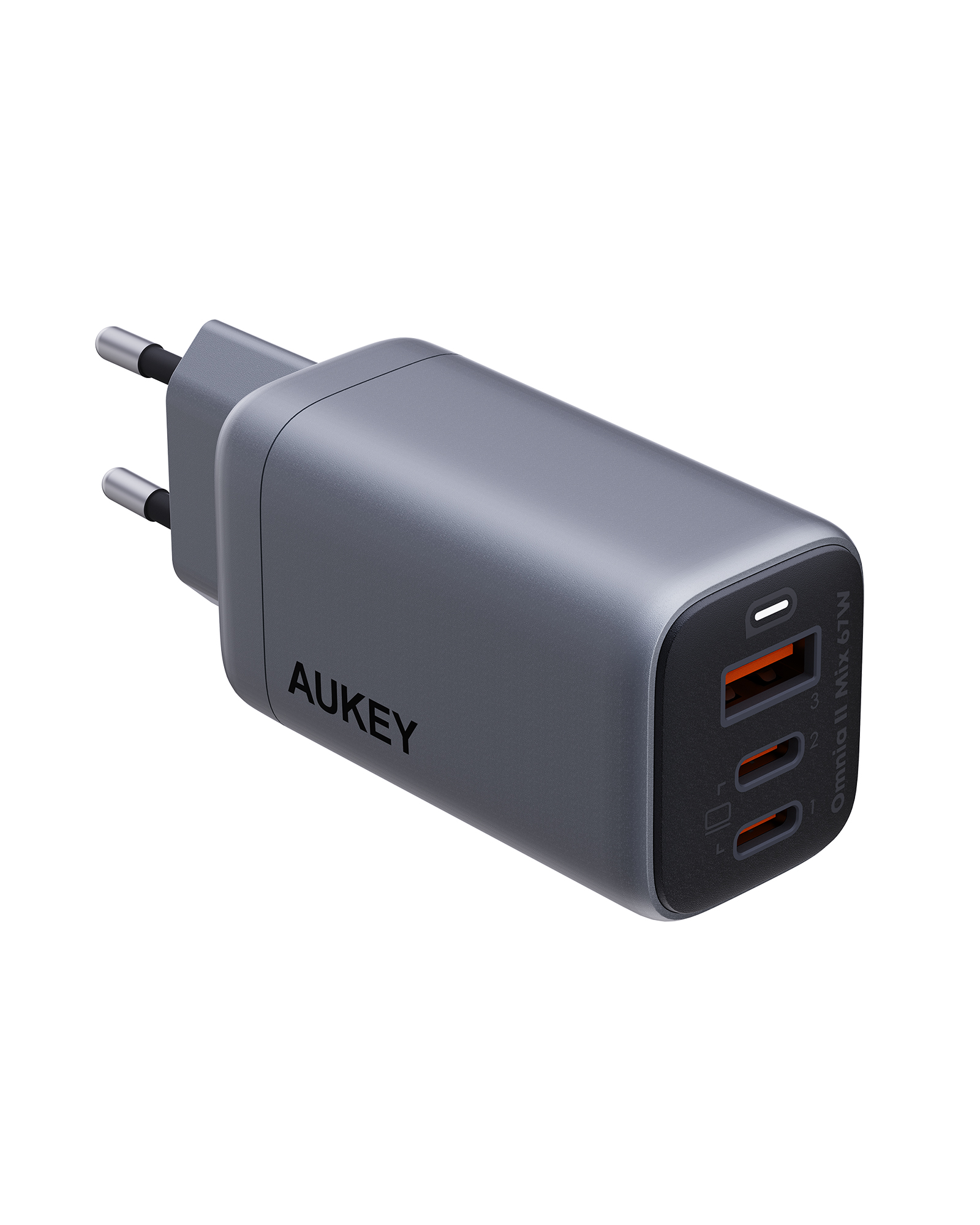 Graues AUKEY-Ladegerät mit zwei USB-Anschlüssen. Es hat eine Ladeanzeige und einen Netzstecker.