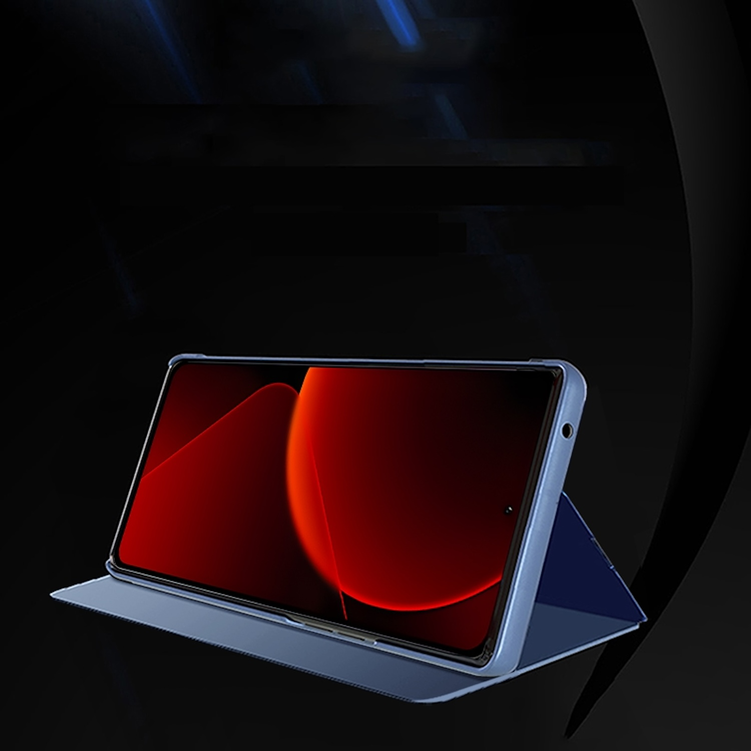 Tableta en una funda azul, abierta, que muestra un fondo rojo y naranja. Fondo negro.