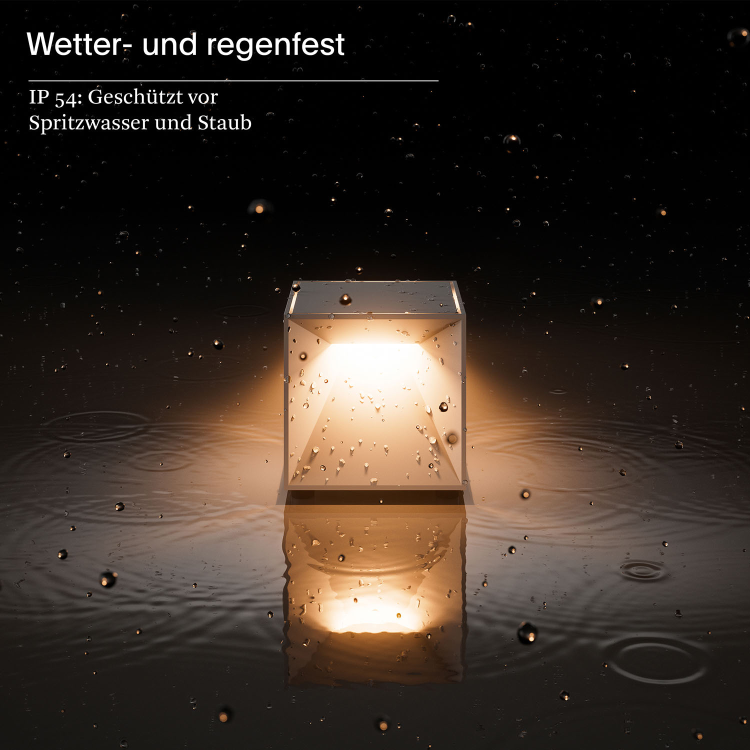 Würfelförmige Lampe im Regen. Text: Wetter- und regenfeste IP 54.