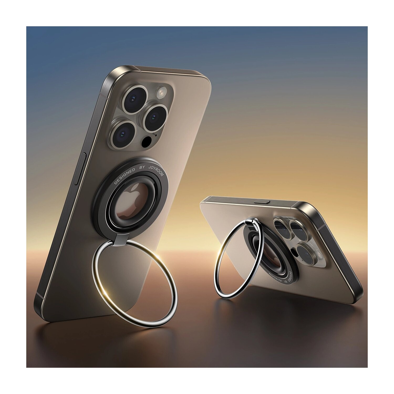 Dwa telefony z uchwytami pierścieniowymi, jeden pochylony, pokazujący uchwyt i detale kamery.