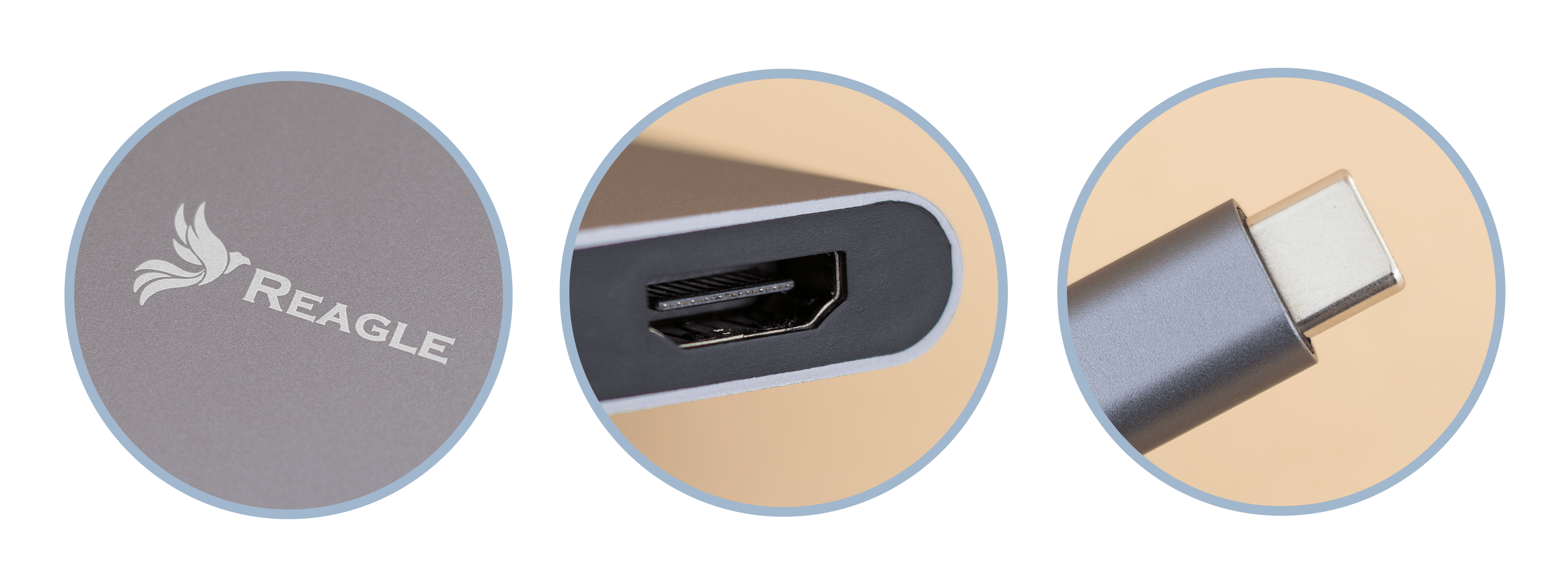 Zbliżenie szarego urządzenia z logo, portem HDMI i złączem USB-C, wszystko okrągłe.