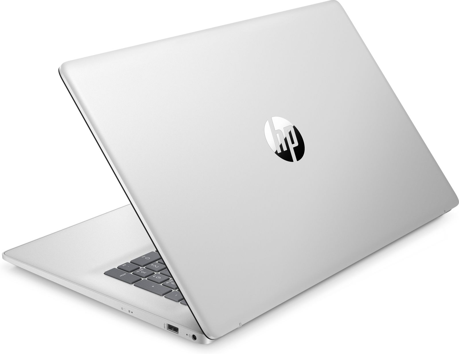Srebrny laptop z logo HP na pokrywie, otwarty, pokazujący klawiaturę, na białym tle.