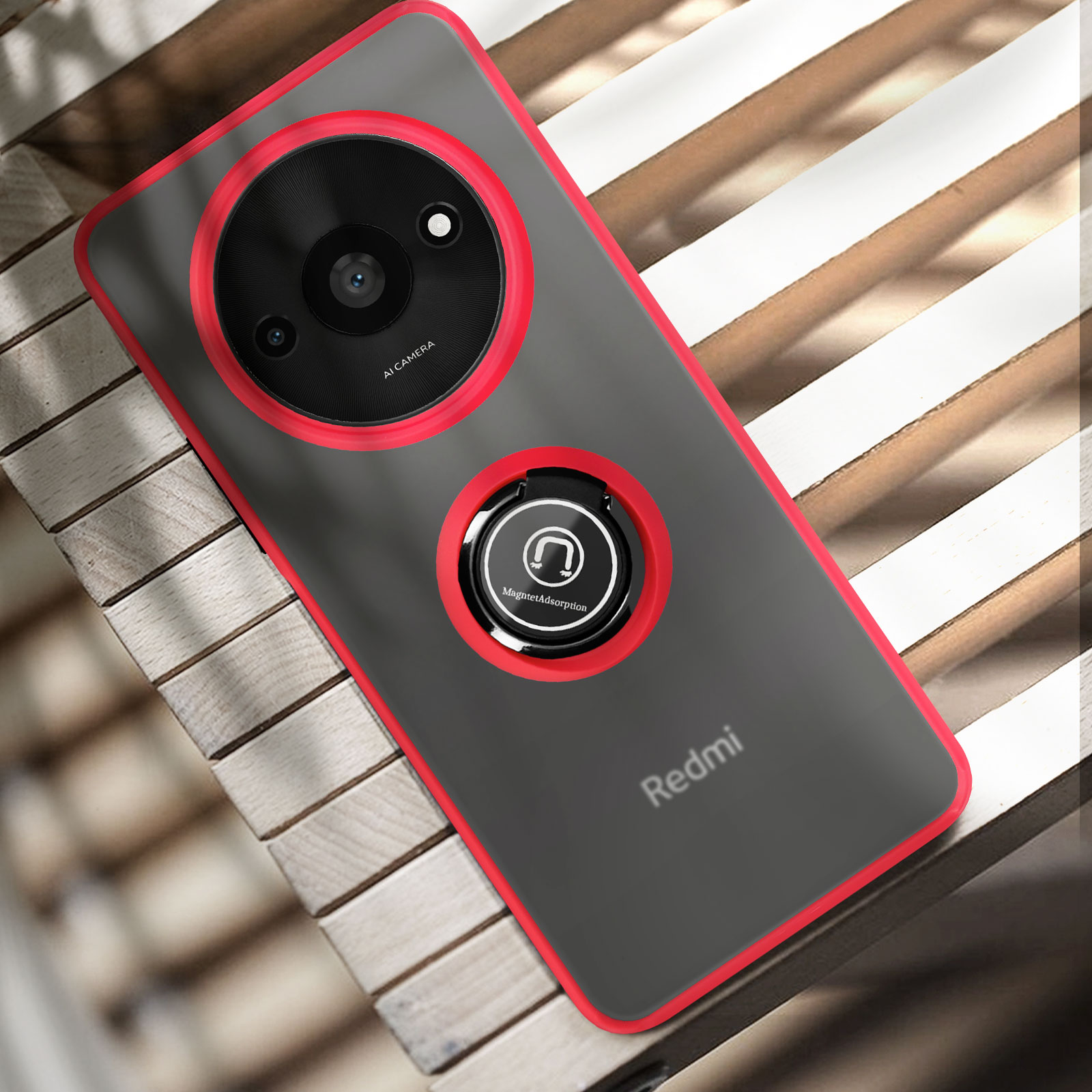Téléphone Redmi avec anneau de caméra arrière et support d'anneau magnétique, sur surface bois.