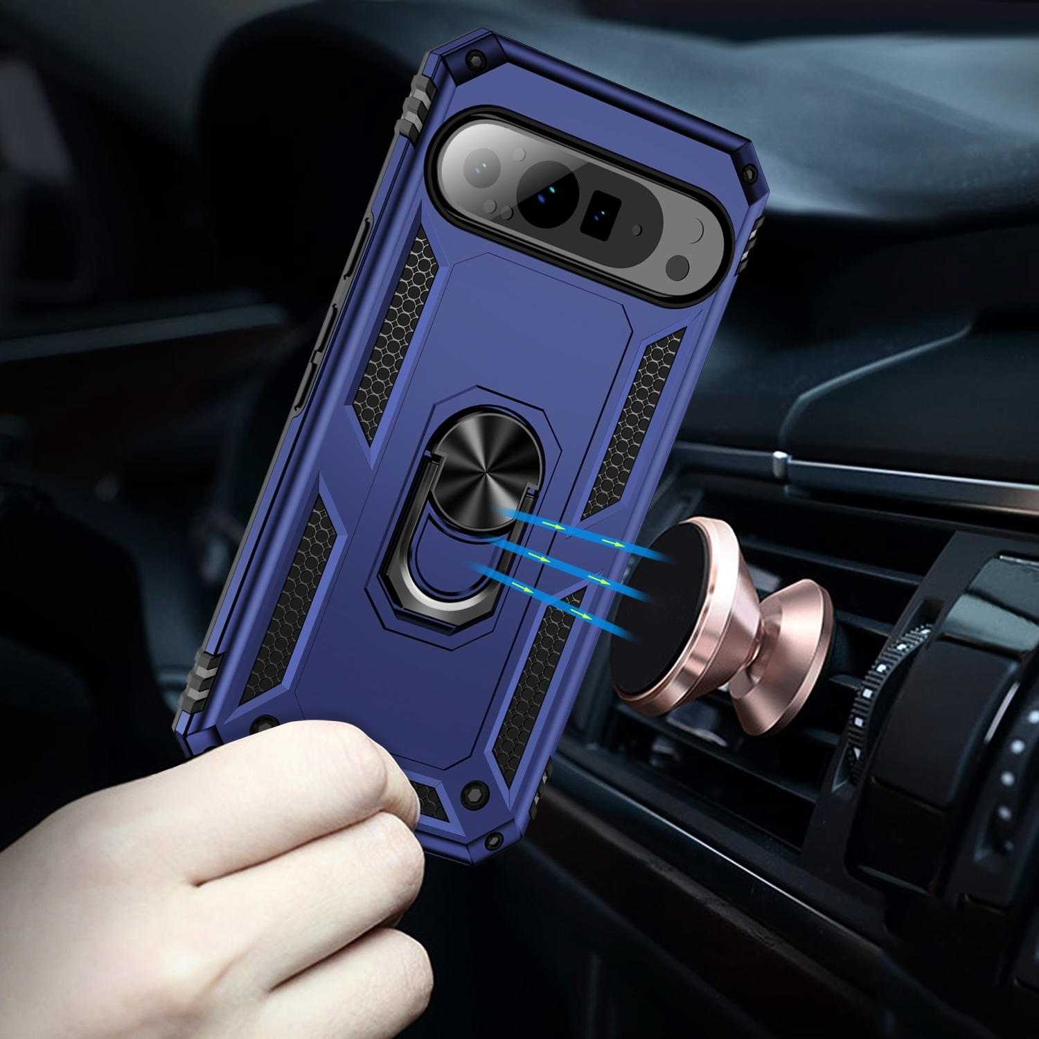 Eine Handyhülle mit einem Ringhalter. Das Telefon befindet sich in einem Auto, in der Nähe der Lüftungsöffnung. Der Halter ist roségoldfarben.