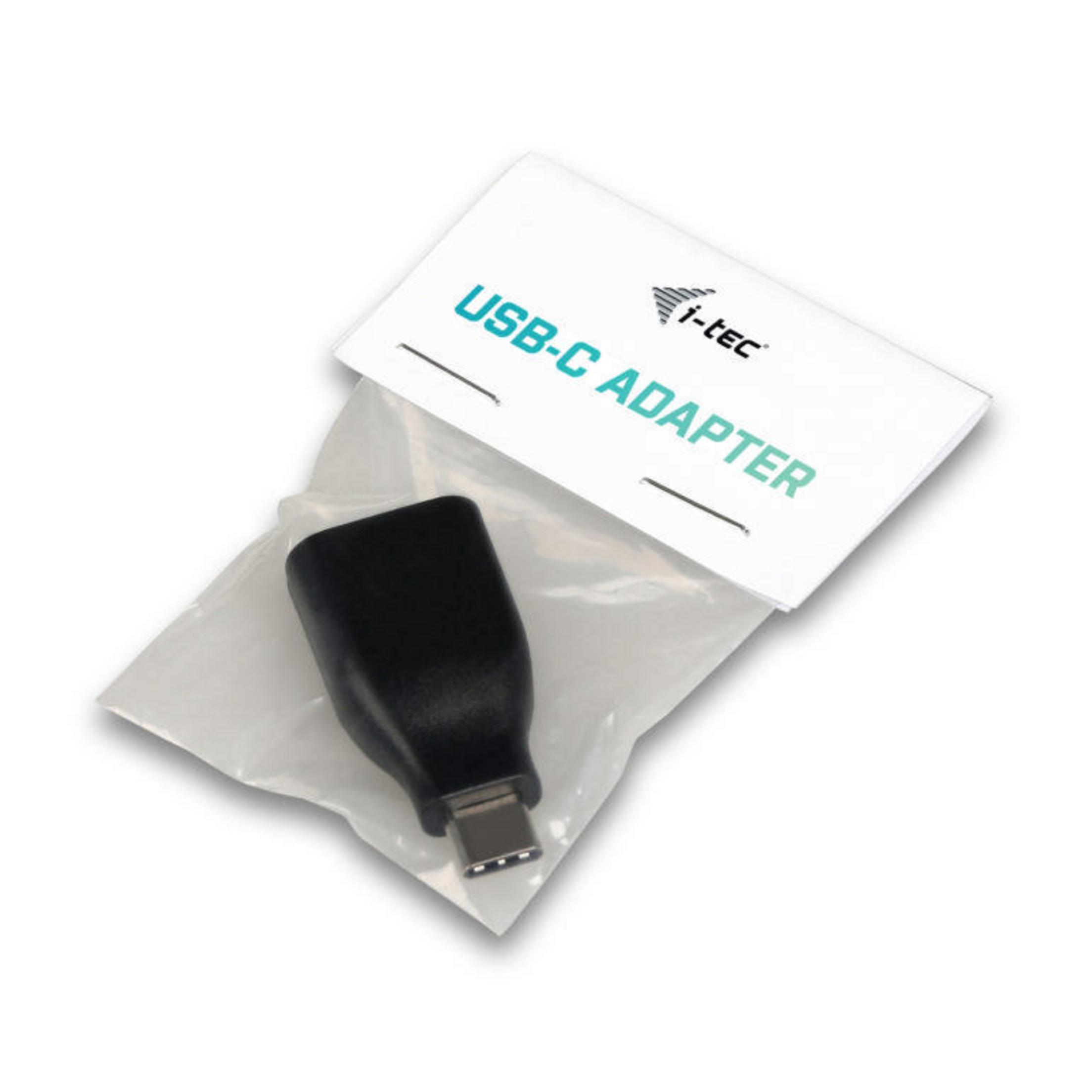 USB-C adapter in een doorzichtige plastic zak met een witte kaart. De kaart zegt USB-C ADAPTER.