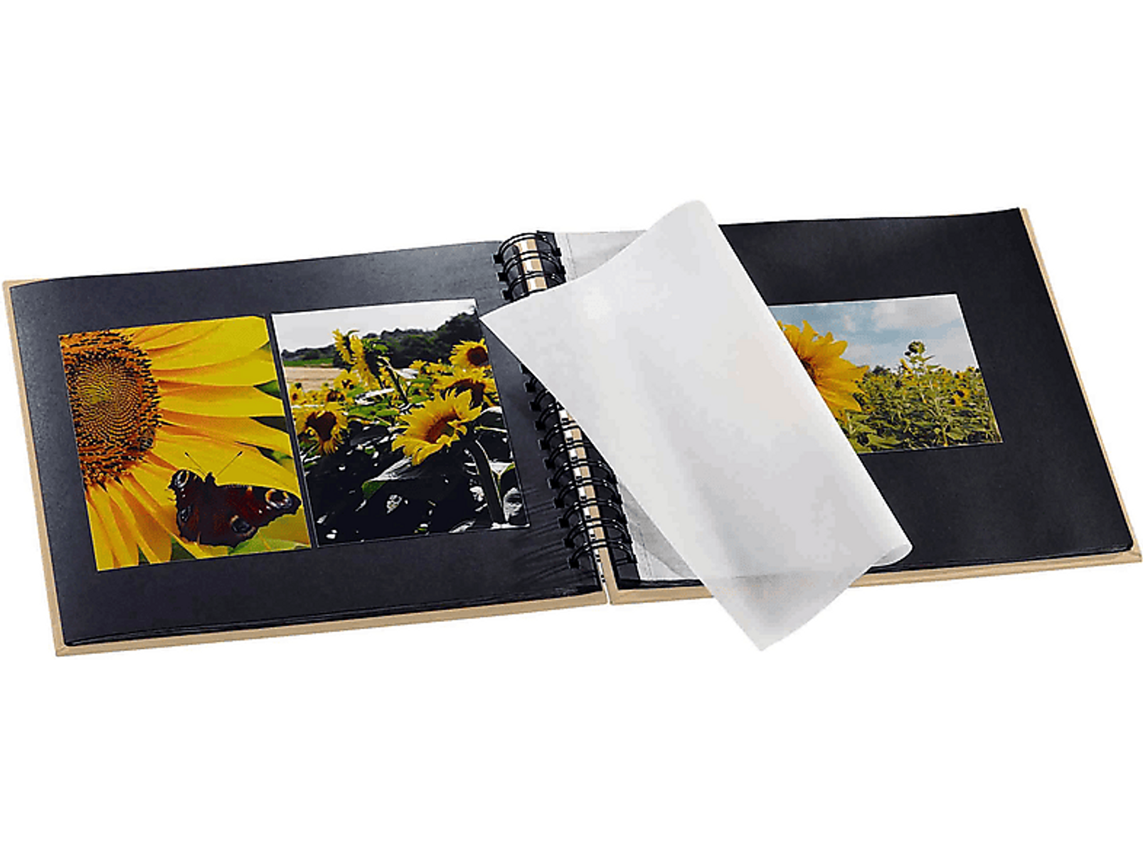 Otwarty album fotograficzny ze zdjęciami słoneczników i motylem.