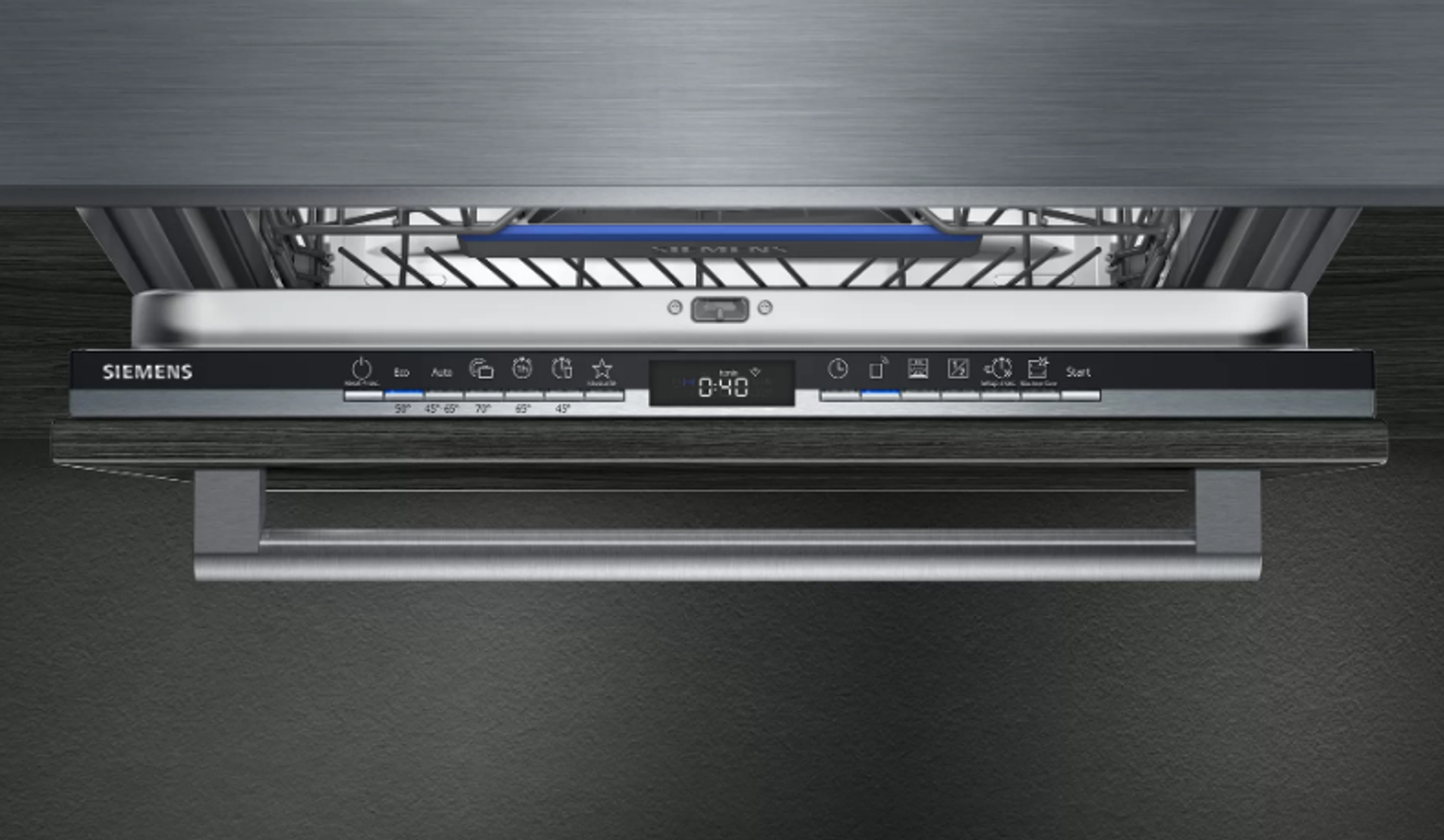 Dishwasher interior, showing the control panel and the top rack.