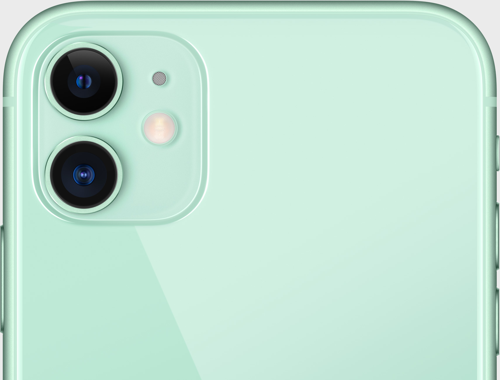 Primo piano del retro di un iPhone 11 verde menta con due fotocamere.