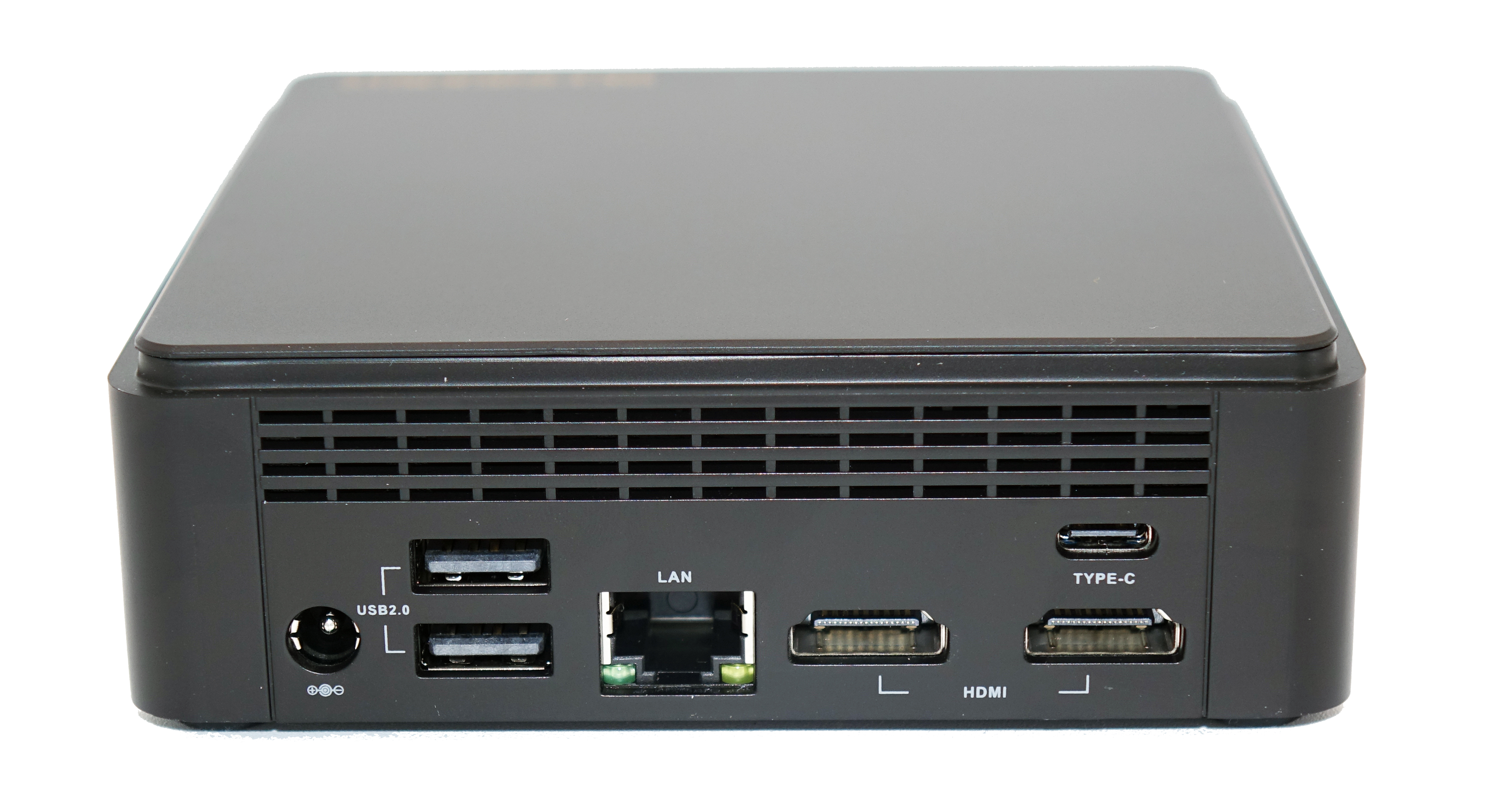 Czarne centrum multimedialne z wieloma portami, w tym USB, HDMI i LAN, białe tło.