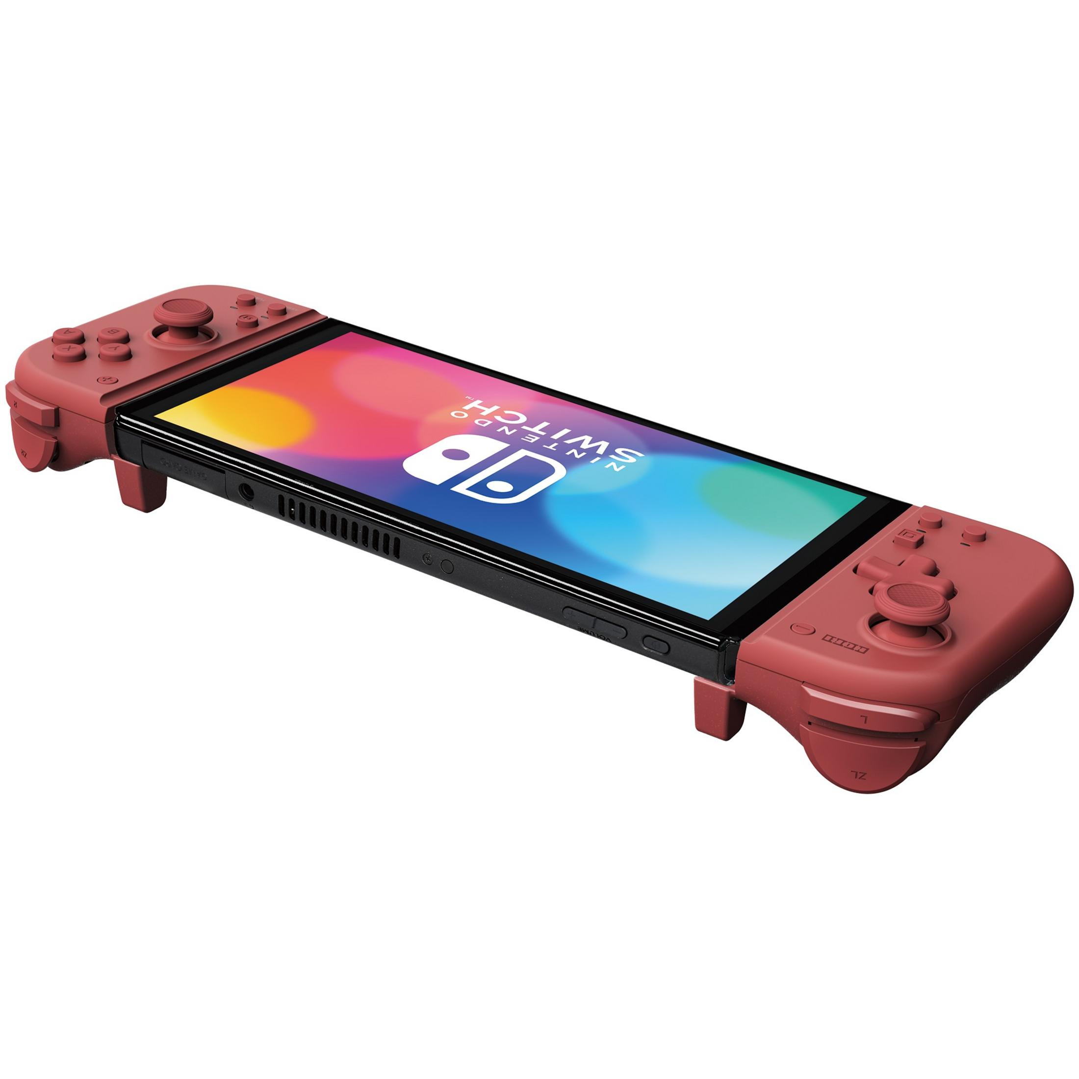 Czerwono-czarny Nintendo Switch z dołączonymi czerwonymi kontrolerami. Ekran wyświetla SWITCH.