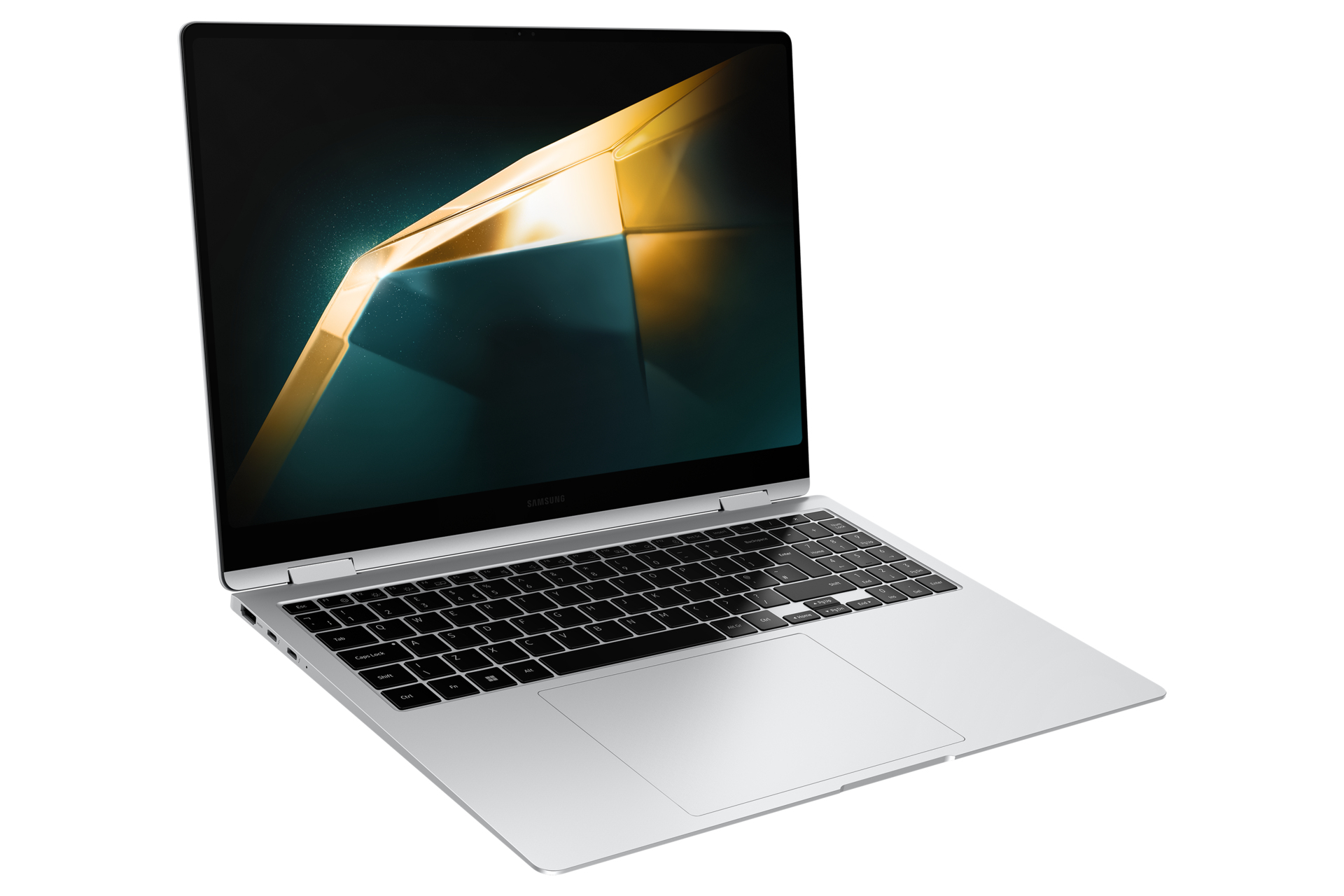 Laptop argentato su sfondo bianco. Lo schermo mostra un design geometrico dorato.
