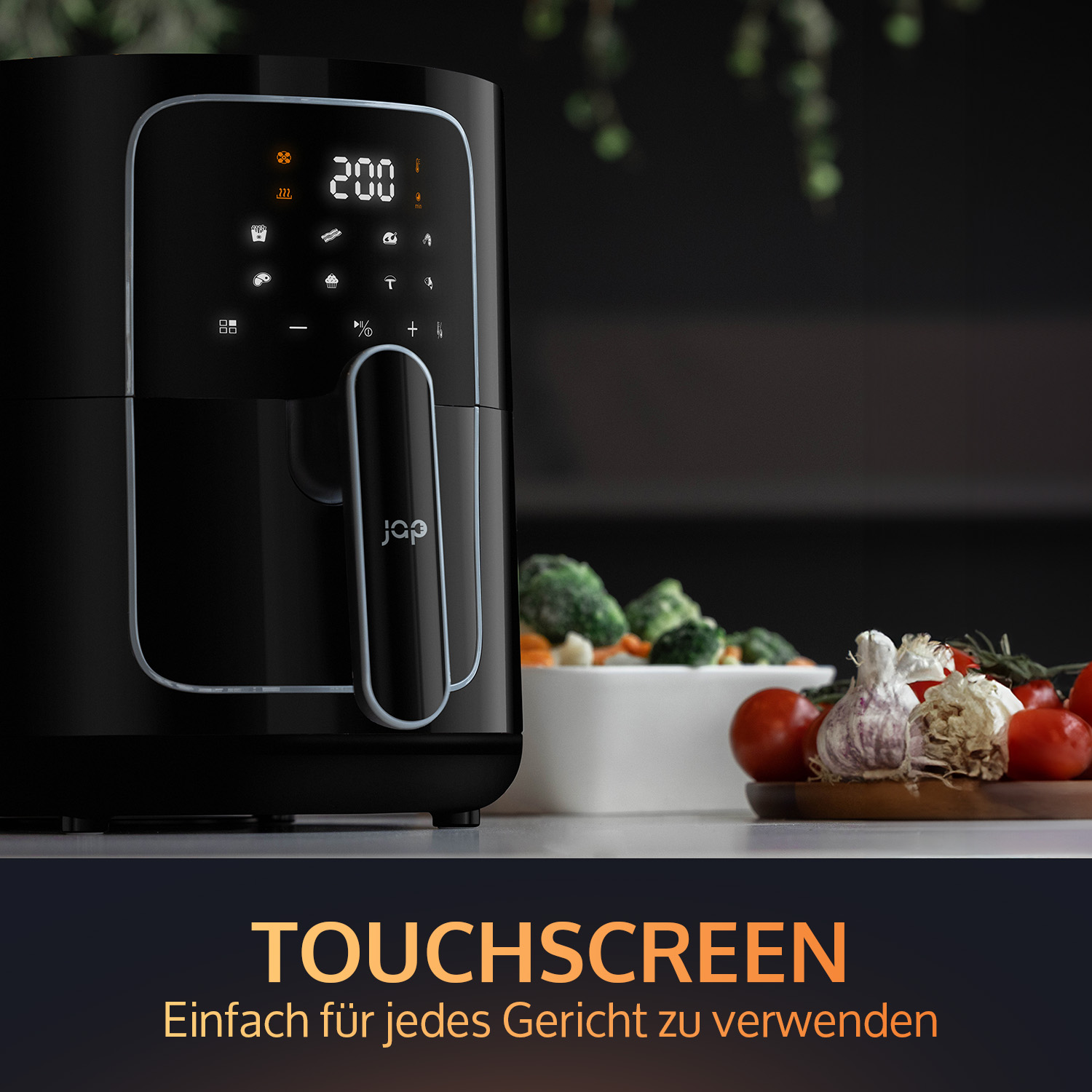 Black air fryer with touchscreen controls, displayed food, and text 'TOUCHSCREEN' in front.
