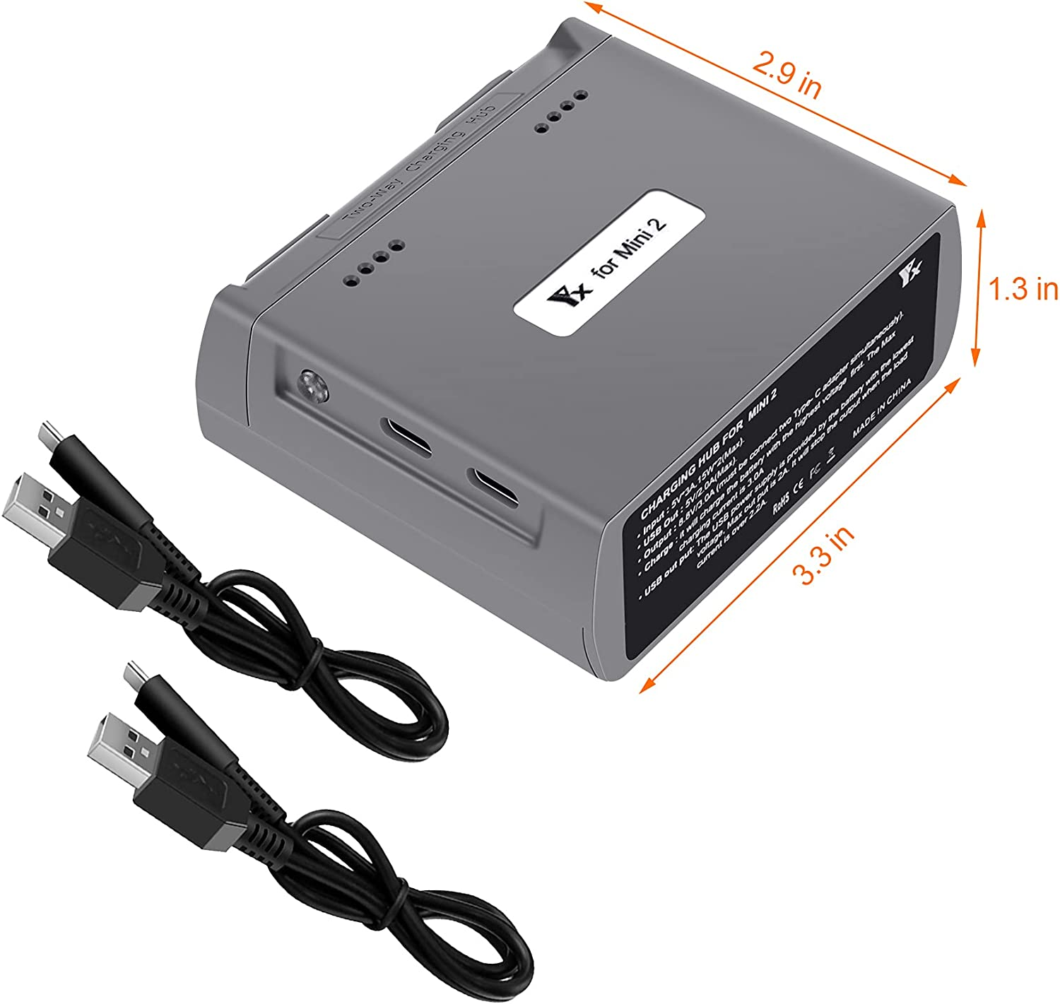 Grauer Ladehub für Mini 2 Drohnen, mit zwei USB-Kabeln, auf weißem Hintergrund.