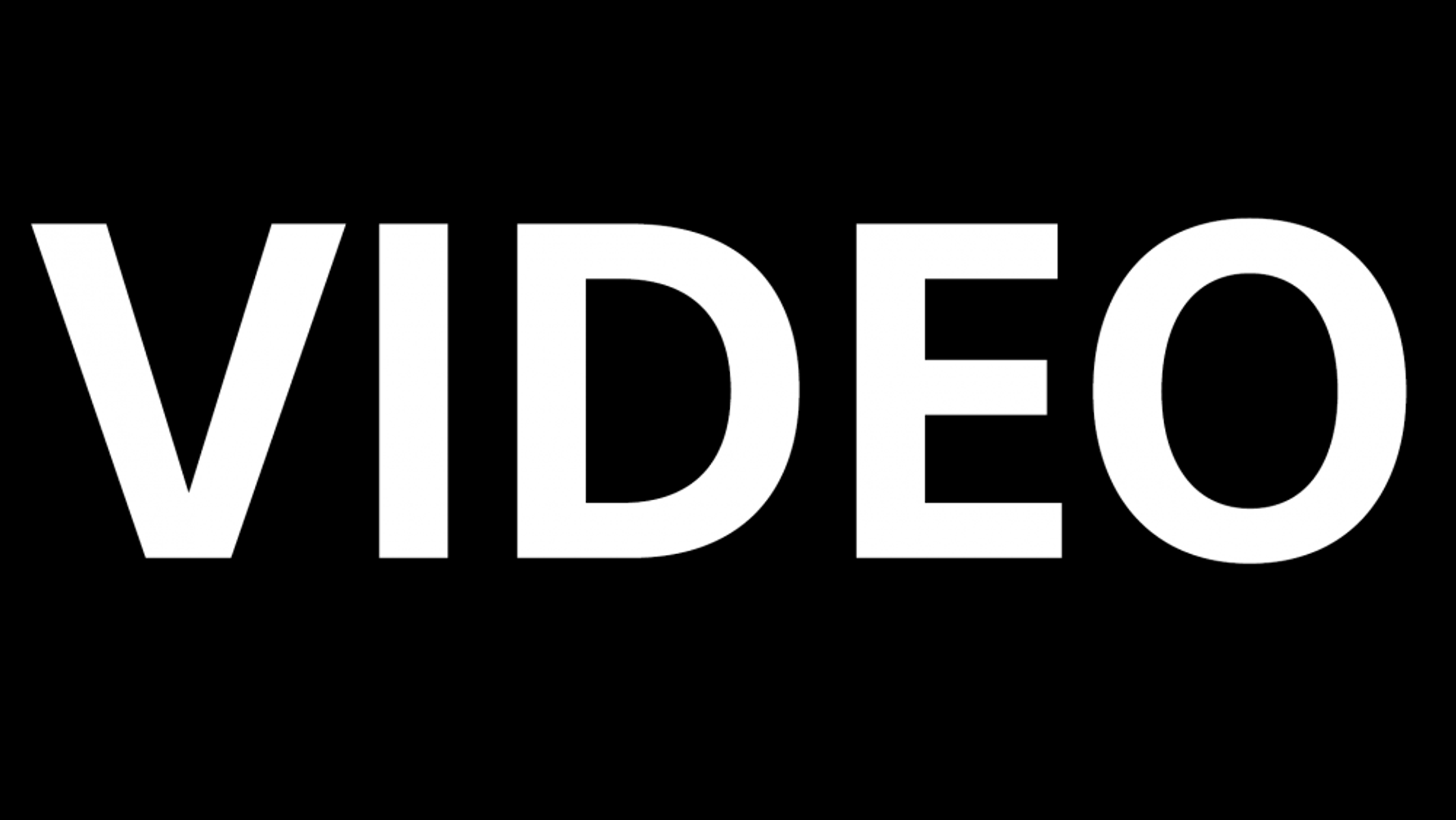 Testo bianco su sfondo nero: VIDEO.