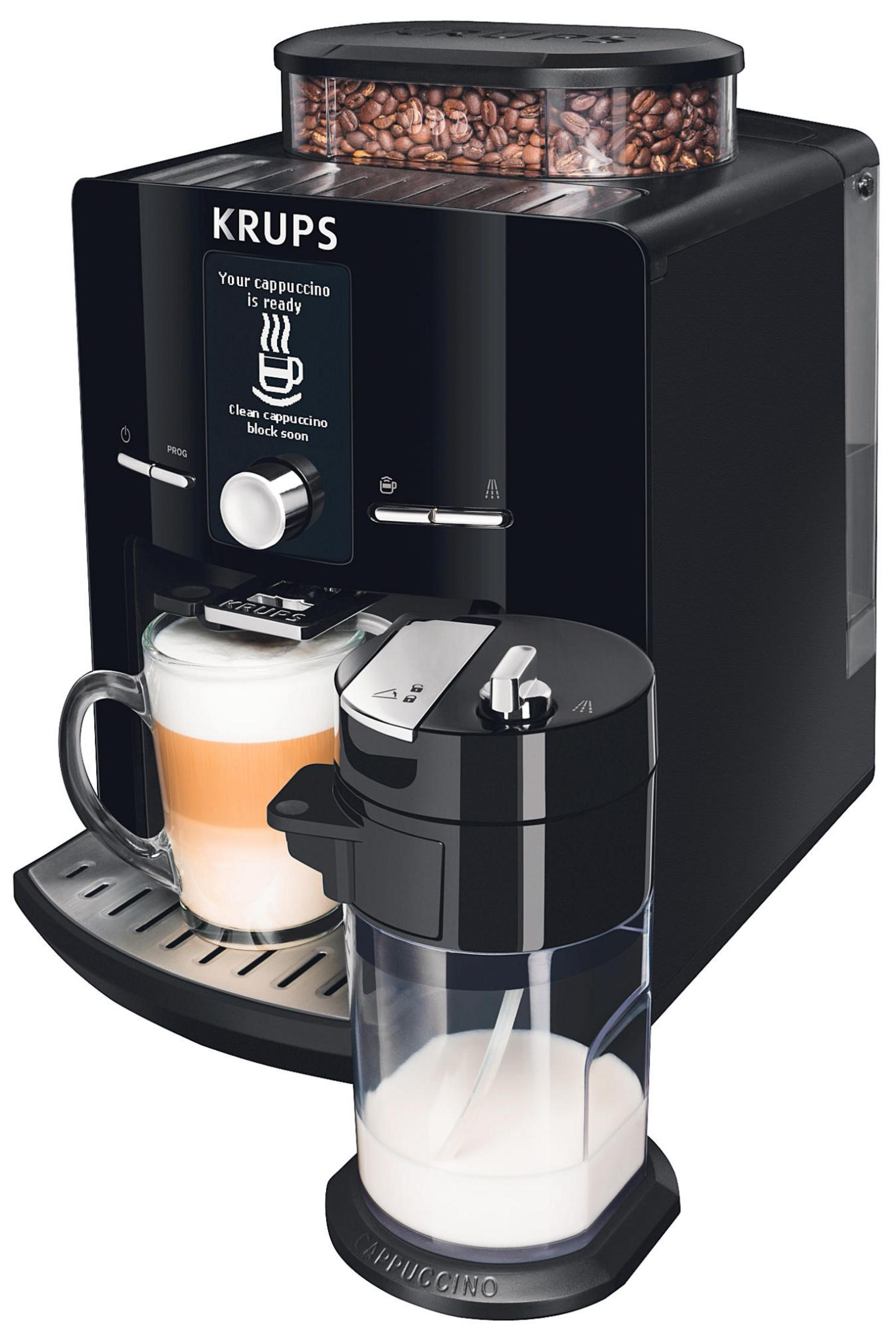 Schwarze Krups Kaffeemaschine mit Bohnenbehälter, Milchbehälter und einer Tasse Cappuccino.