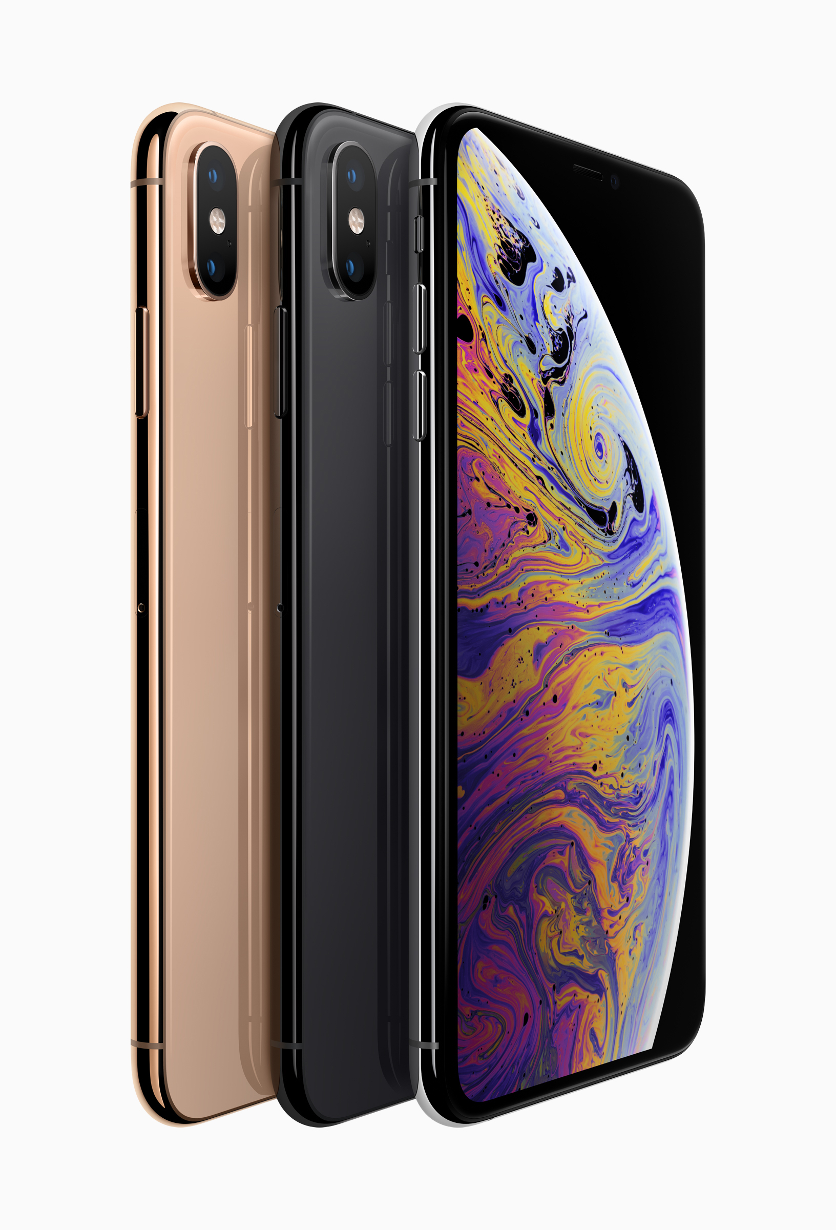 Trois smartphones : or, noir et argent. Affichant des fonds d'écran colorés. Fond blanc.