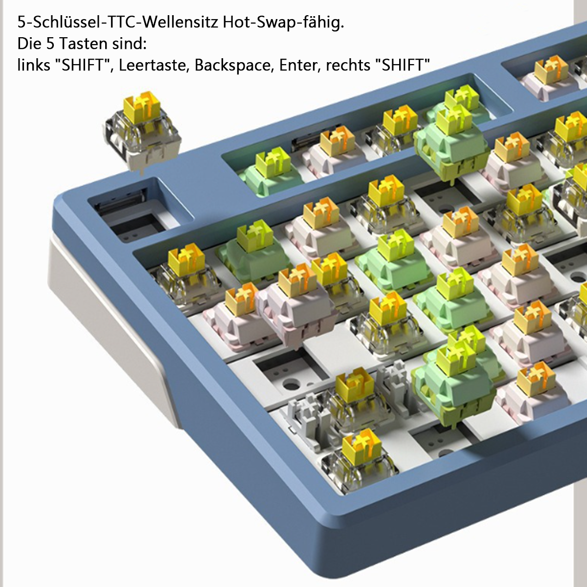 Eine mechanische Tastatur mit sichtbaren Schaltern und Tastenkappen. Einige Schalter sind entfernt, um die Basis zu zeigen.