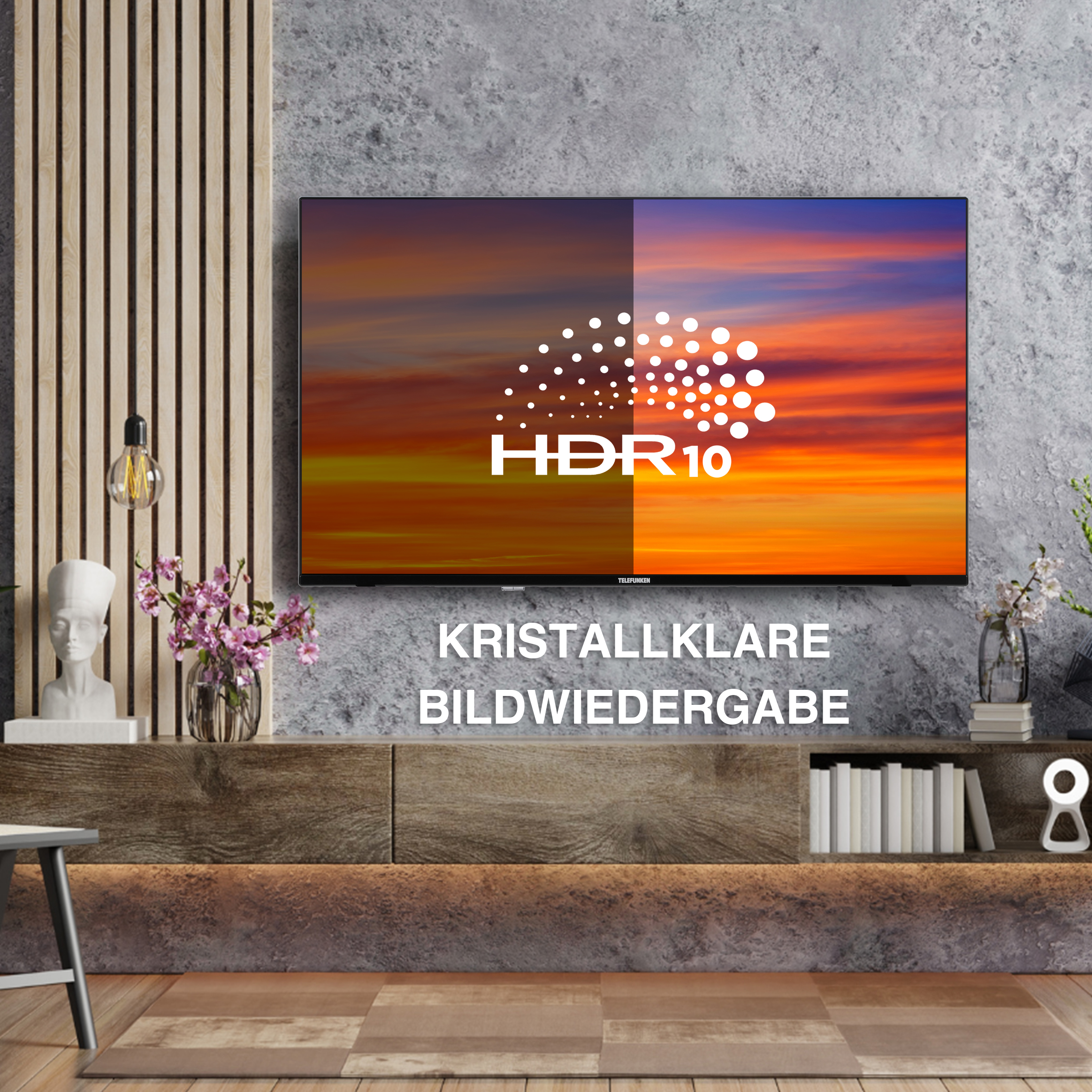 Ein Fernsehbildschirm mit Sonnenuntergang, deutscher Text an grauer Wand.