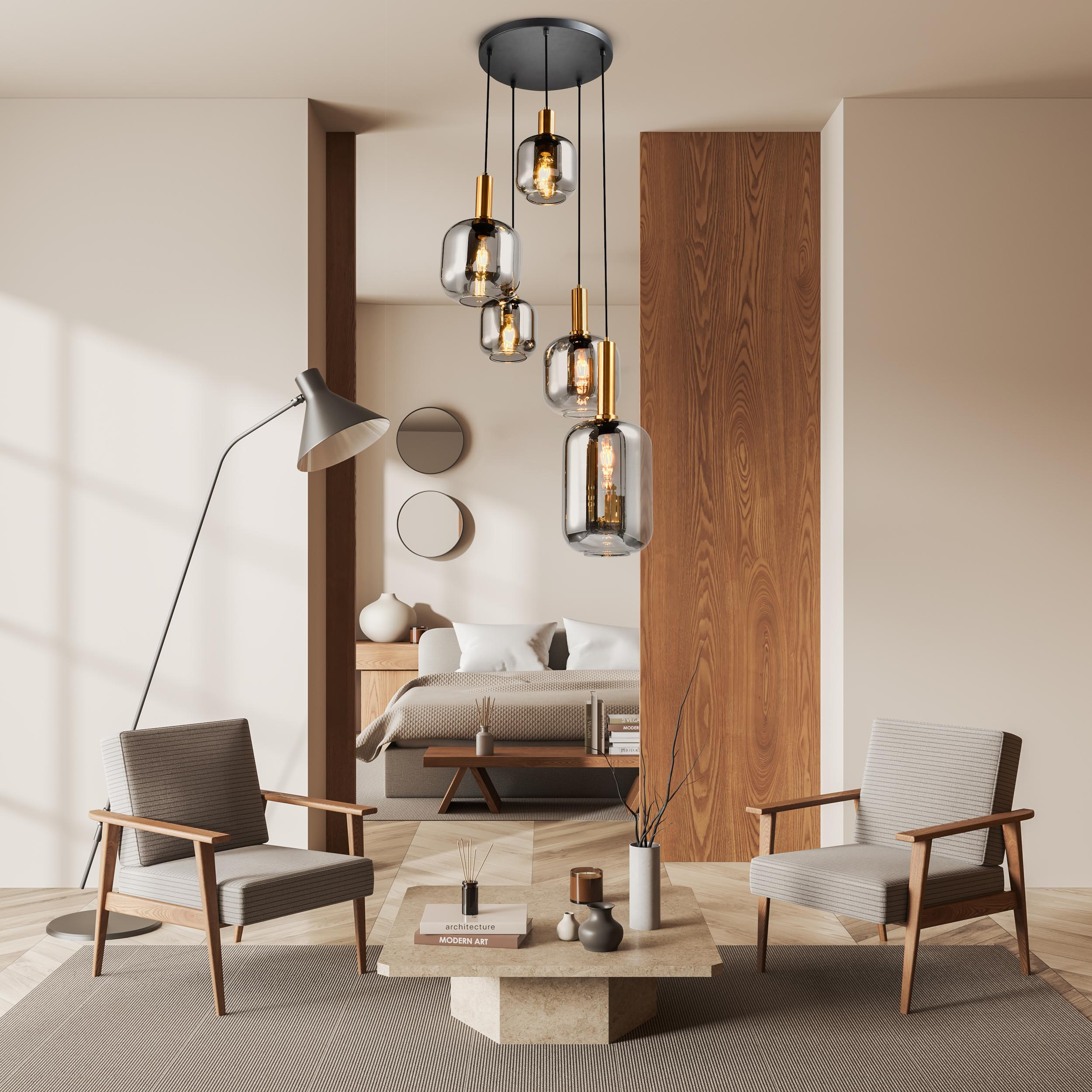 Intérieur avec suspensions, fauteuils et table basse. Une chambre à coucher en arrière-plan.