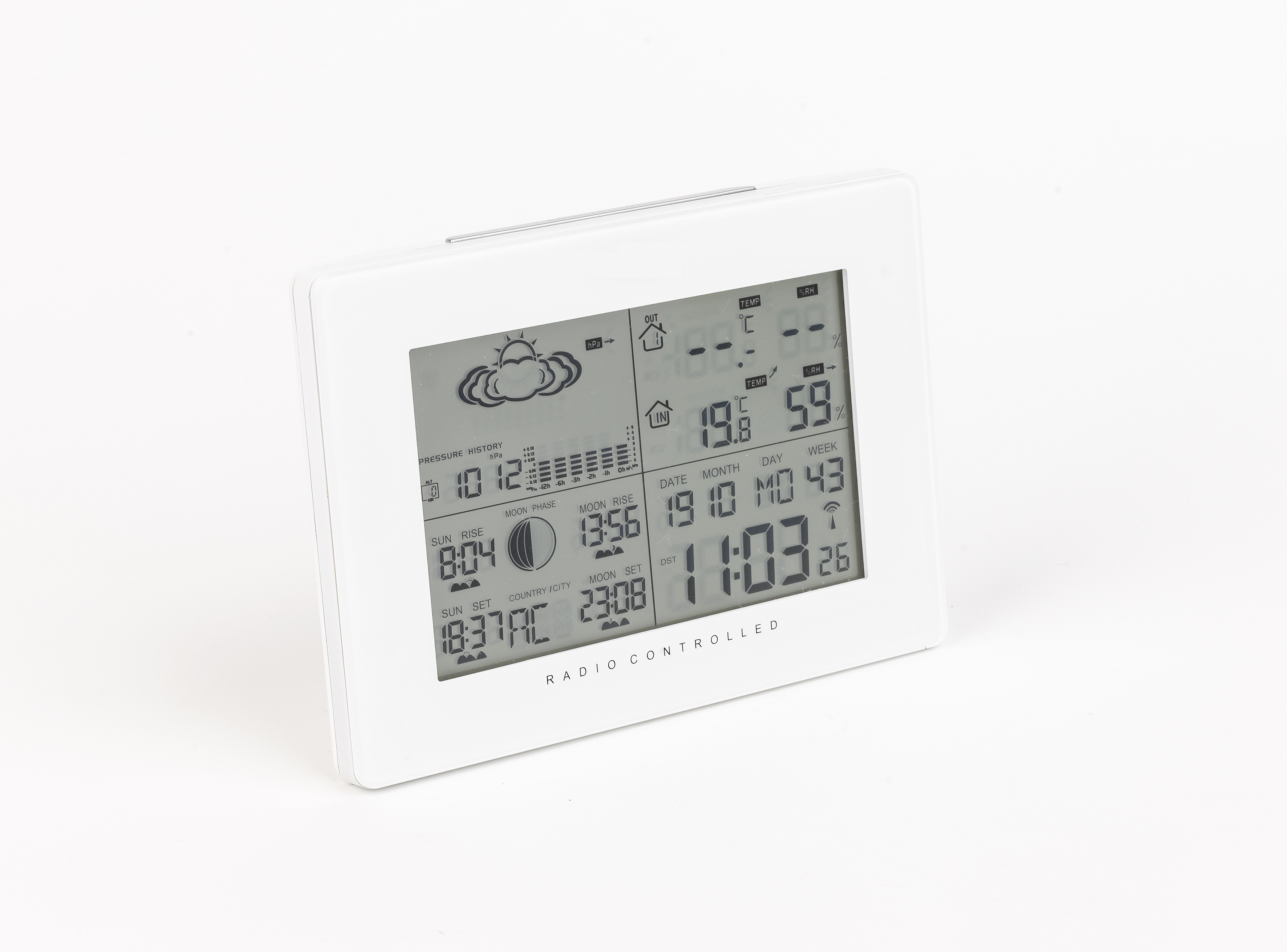 White digital weather station displaying weather forecast, time, temperature, and date on a white surface.