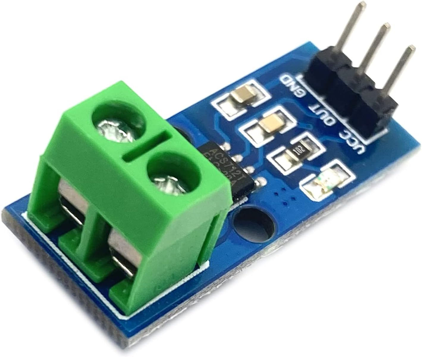 Eine blaue Leiterplatte mit einem grünen Klemmenblock und elektronischen Bauteilen.