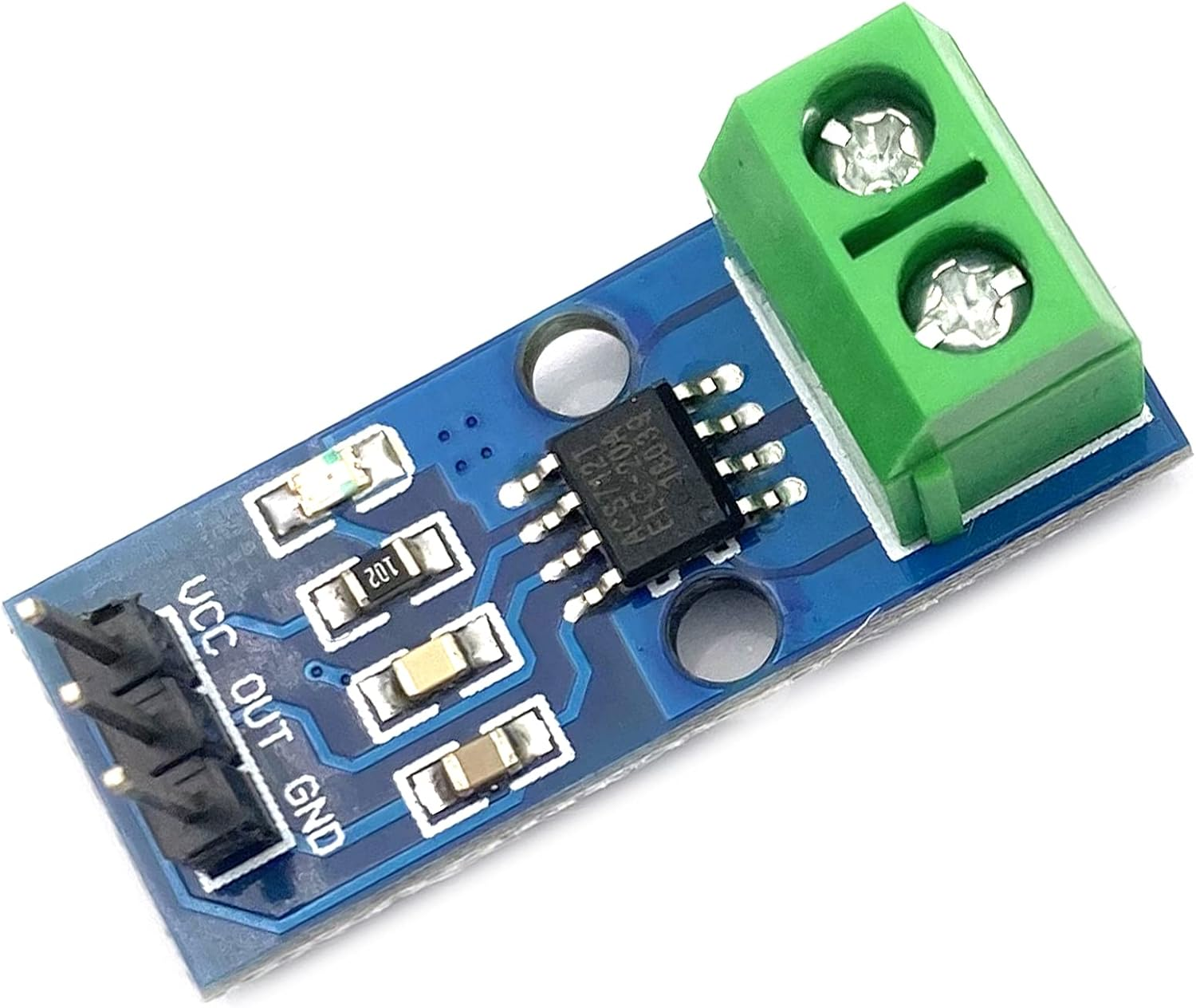 Eine kleine blaue Leiterplatte mit einem grünen Klemmenblock und mehreren elektronischen Bauteilen.
