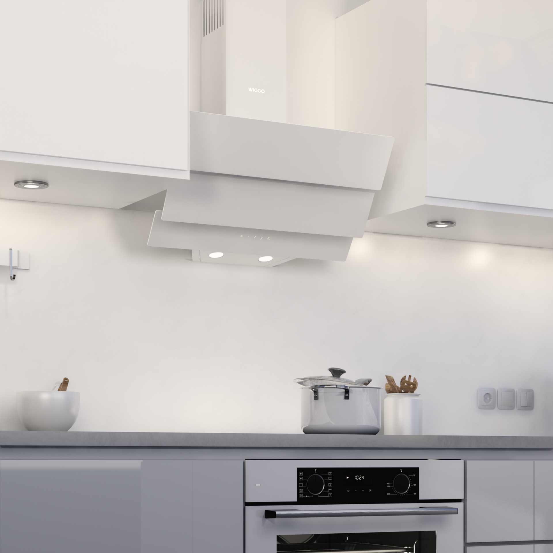 Cuisine moderne avec meubles blancs, hotte blanche et four en acier inoxydable. Casseroles et poêles.