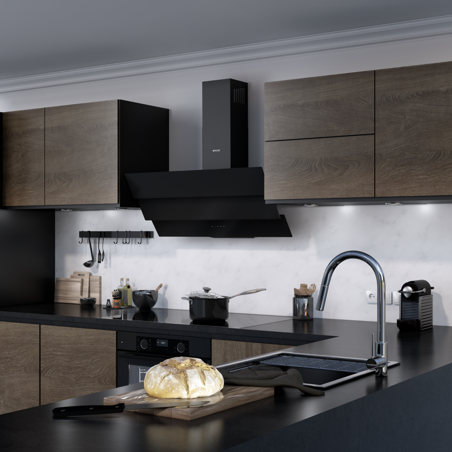 Intérieur de cuisine avec hotte Wiggo noire. Comprend des armoires, un évier et des ustensiles sur le comptoir.