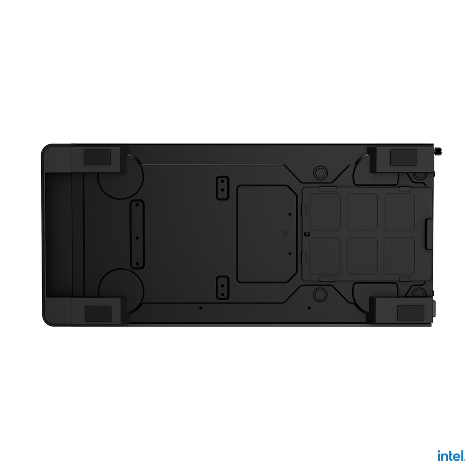 Widok od spodu czarnej obudowy PC. Pokazuje podstawę, nóżki i szczegóły.