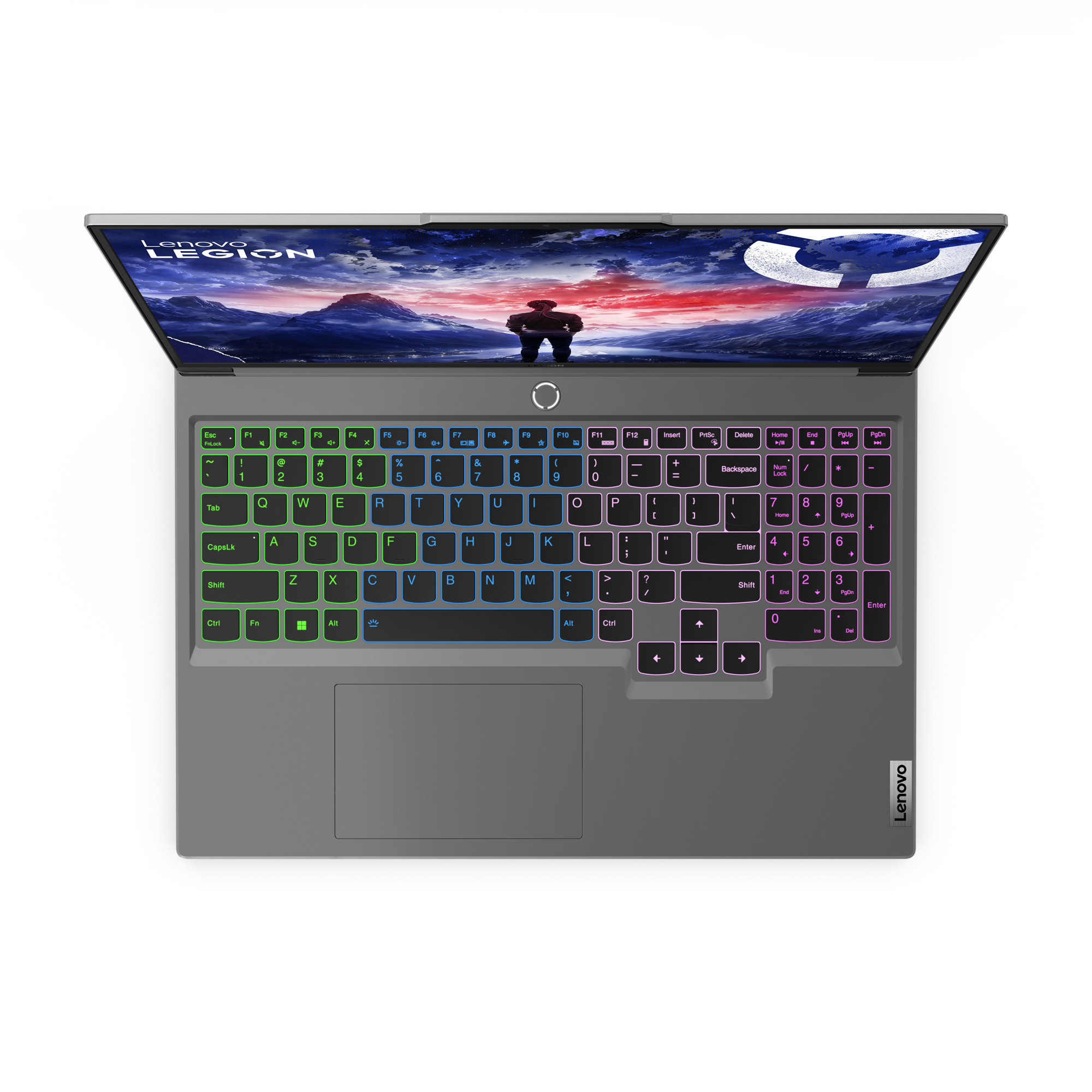 Draufsicht auf einen Lenovo Legion Laptop mit beleuchteter Tastatur und Spielszene auf dem Bildschirm.