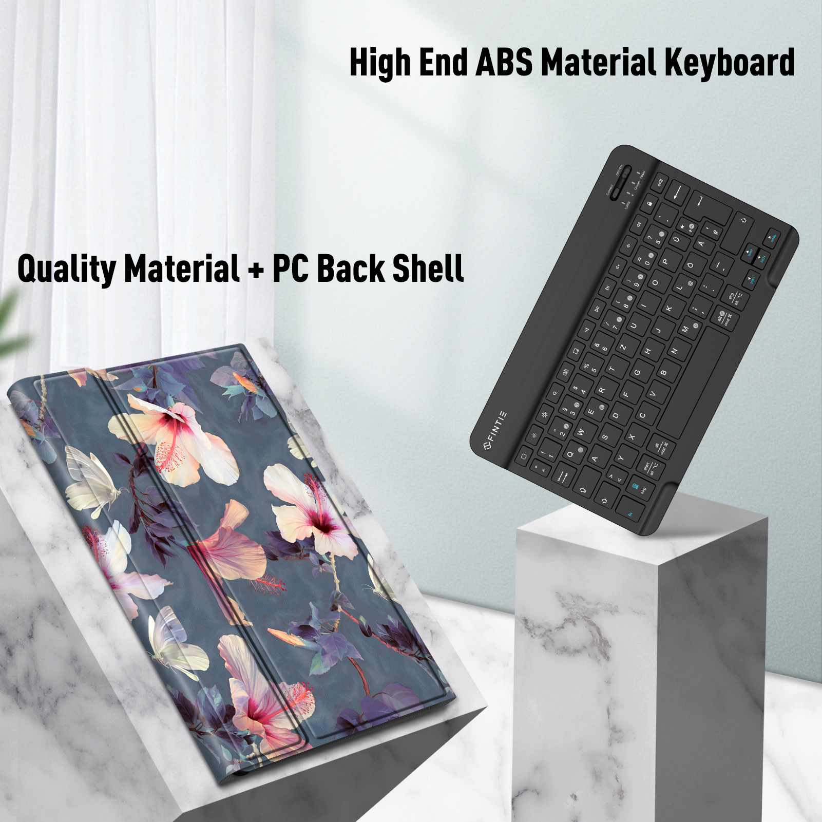 Eine schwarze Tastatur und Tablet-Hülle auf Marmor, mit Text zum Produkt.