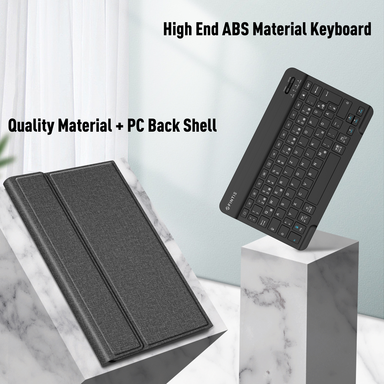 Tablet-Tastatur mit Abdeckung. Weißer Hintergrund und Marmorsockel.