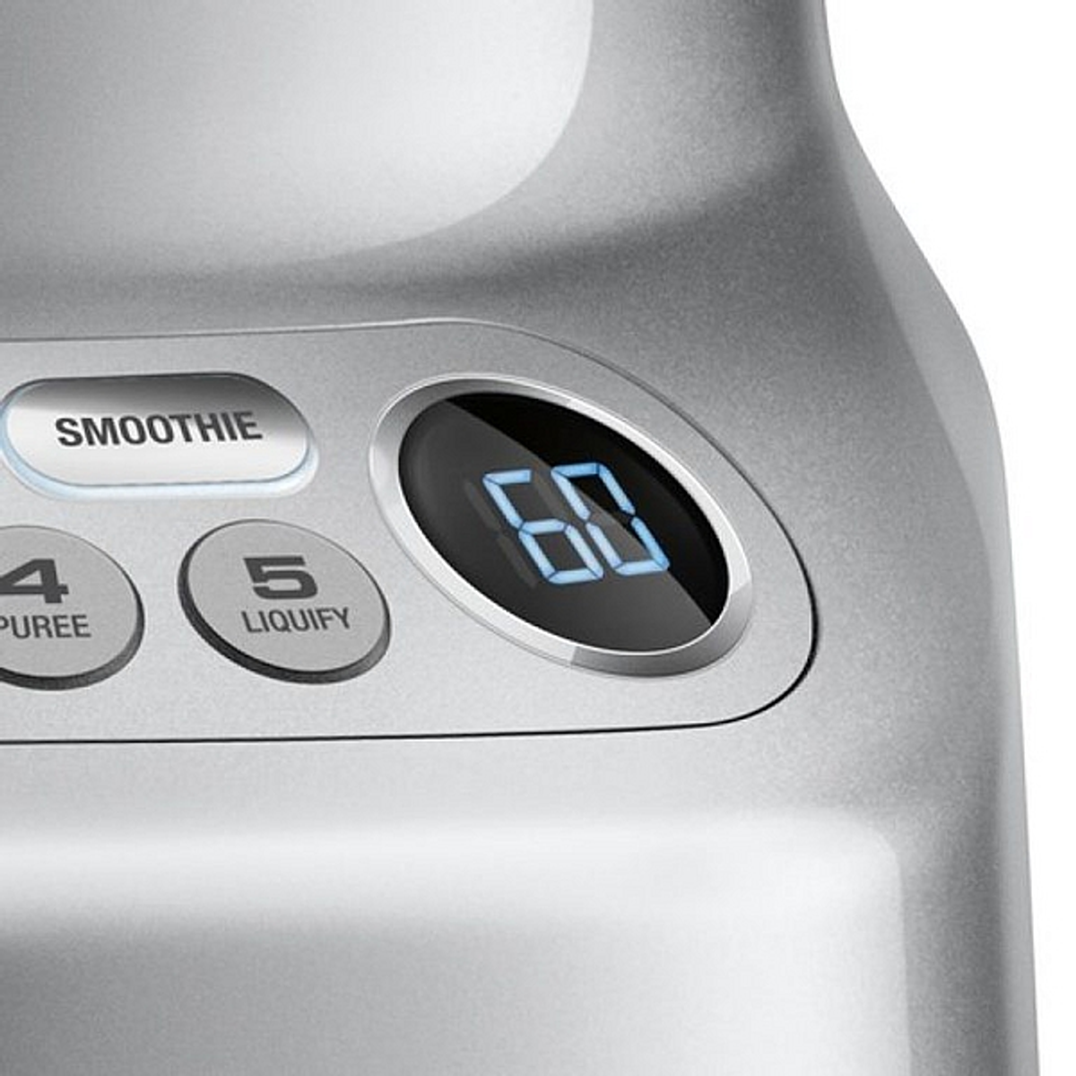 Close-up of a silver blender, showing control panel buttons with a timer display.