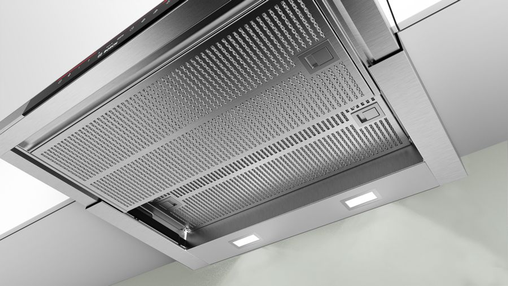 A white and gray fan. It has a protective grill and a stand.