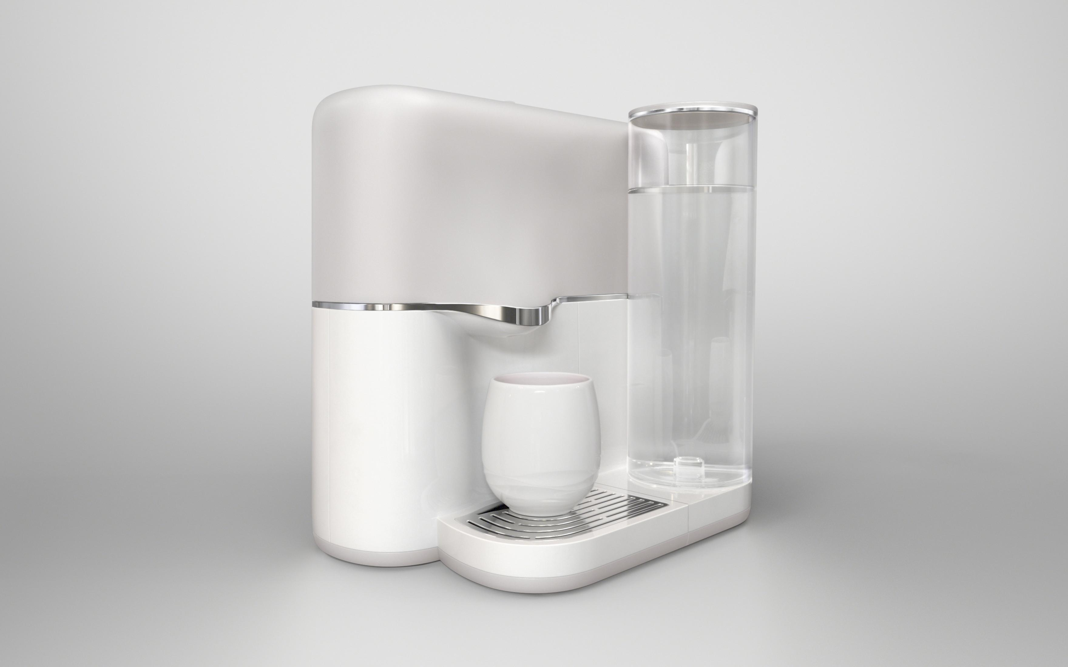 Weiße Kaffeemaschine mit einer Tasse vorne und einem Wasserbehälter an der Seite.