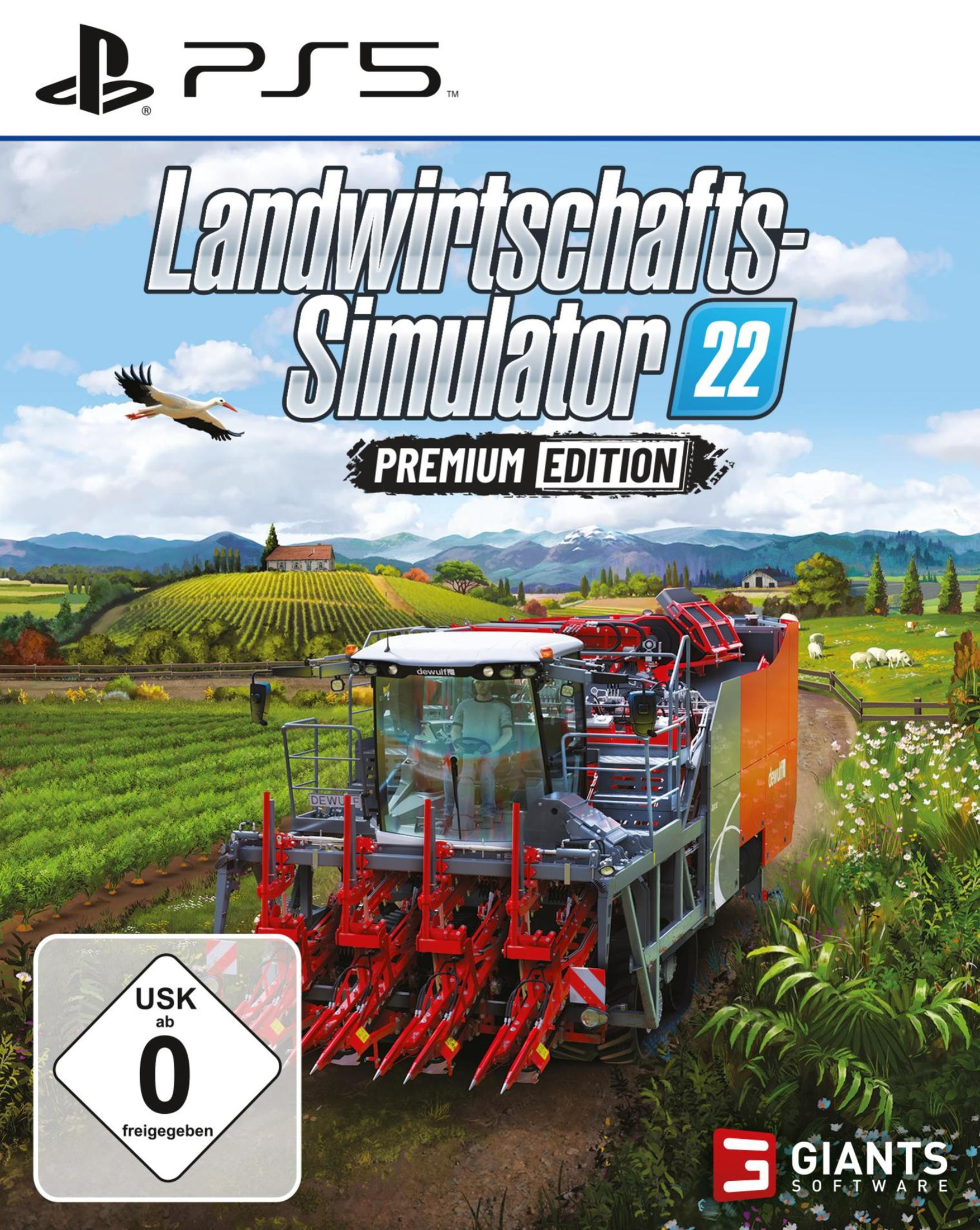Spielbox für Landwirtschafts-Simulator 22. Traktor und Storch auf Feld.